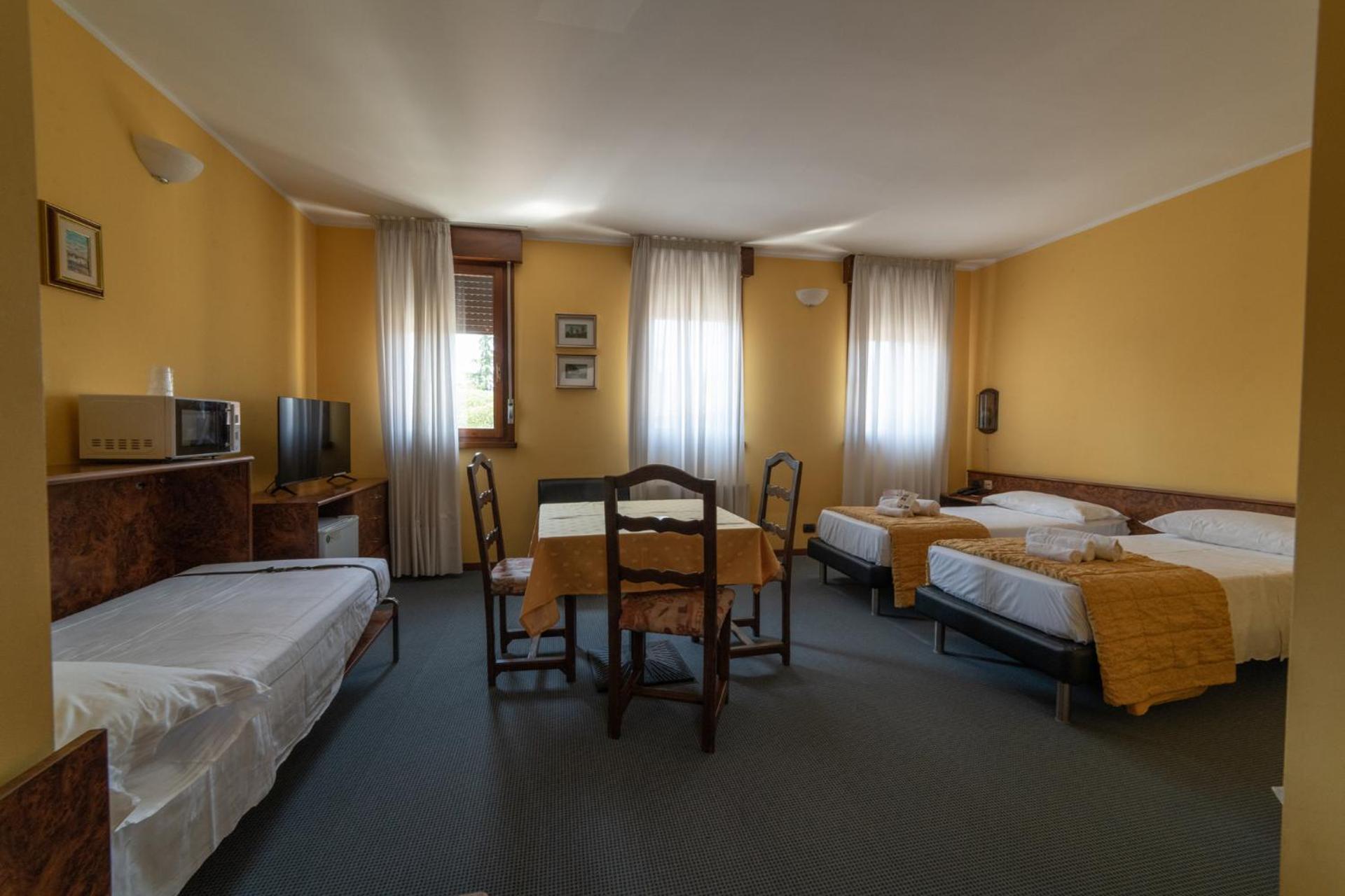 Triple Room - Photo 1