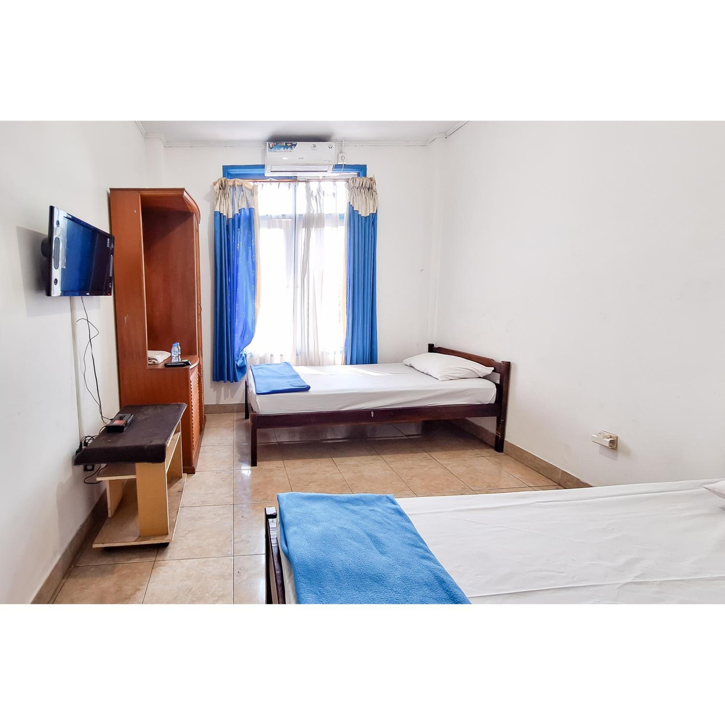 Standard Twin Room - Photo 4