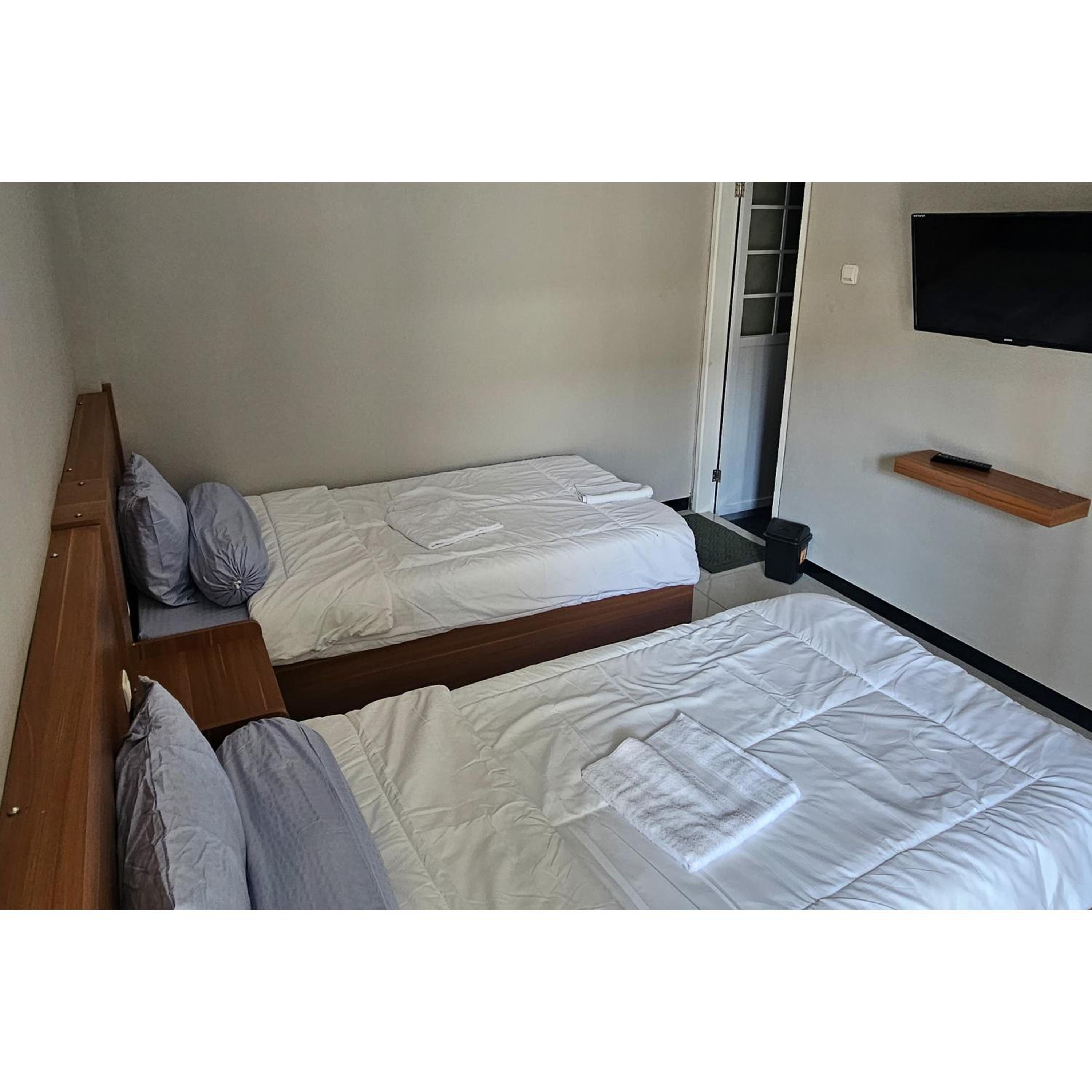 Standard Twin Room - Photo 14
