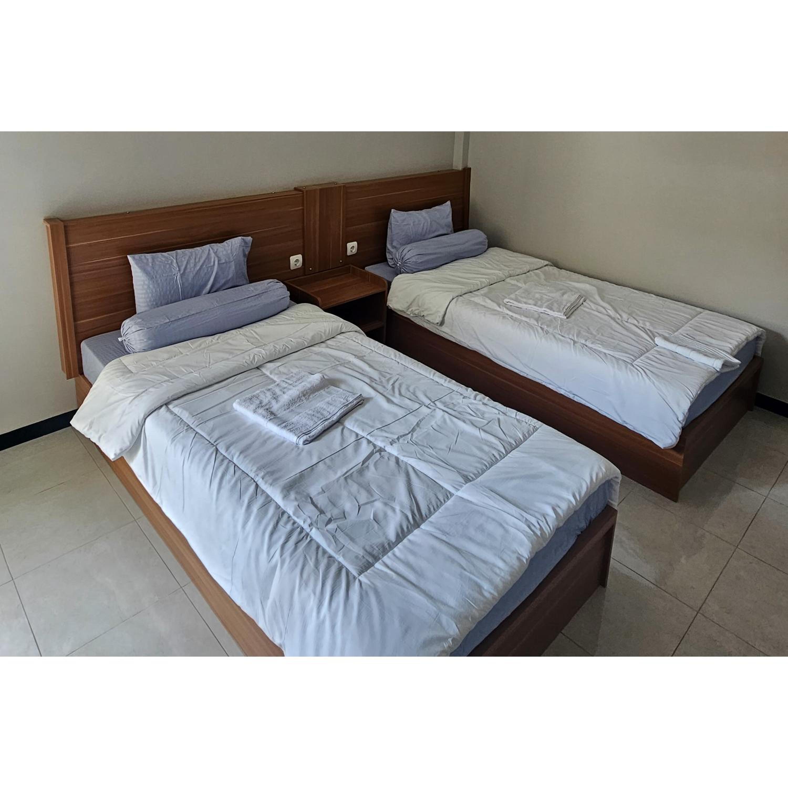 Standard Twin Room - Photo 13