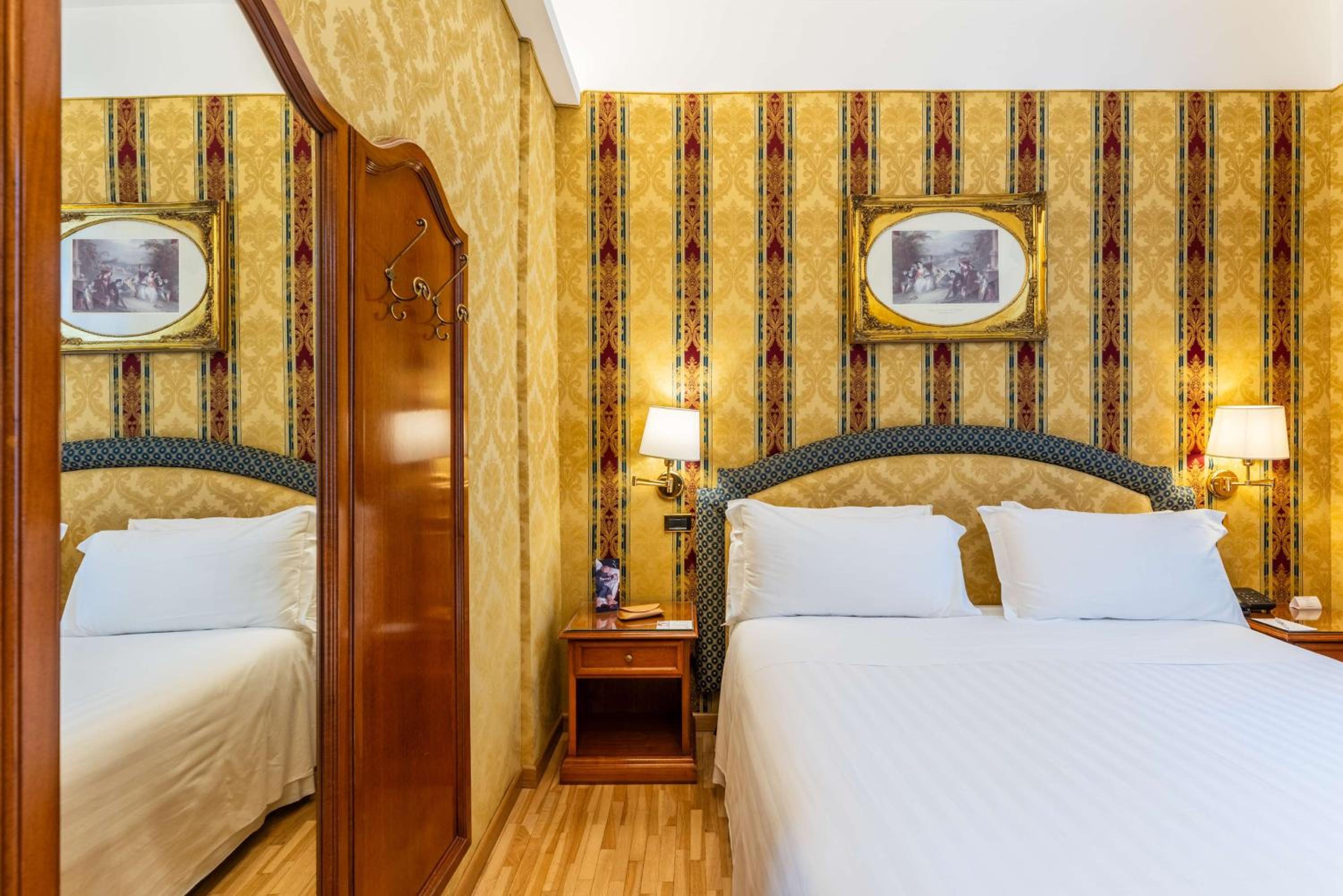 Economy room with double bed and internal window to hall
