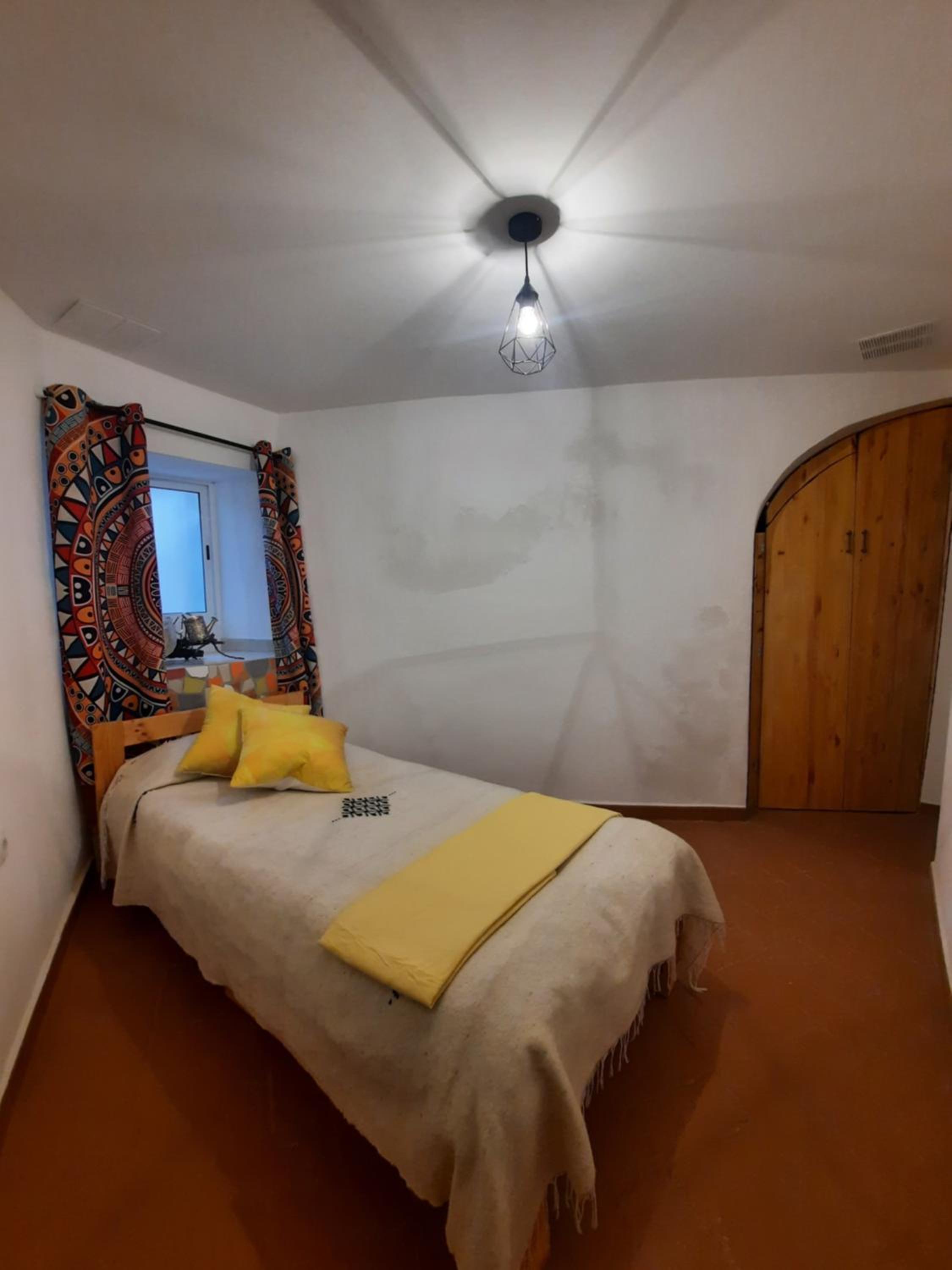 Casa de cuatro habitaciones