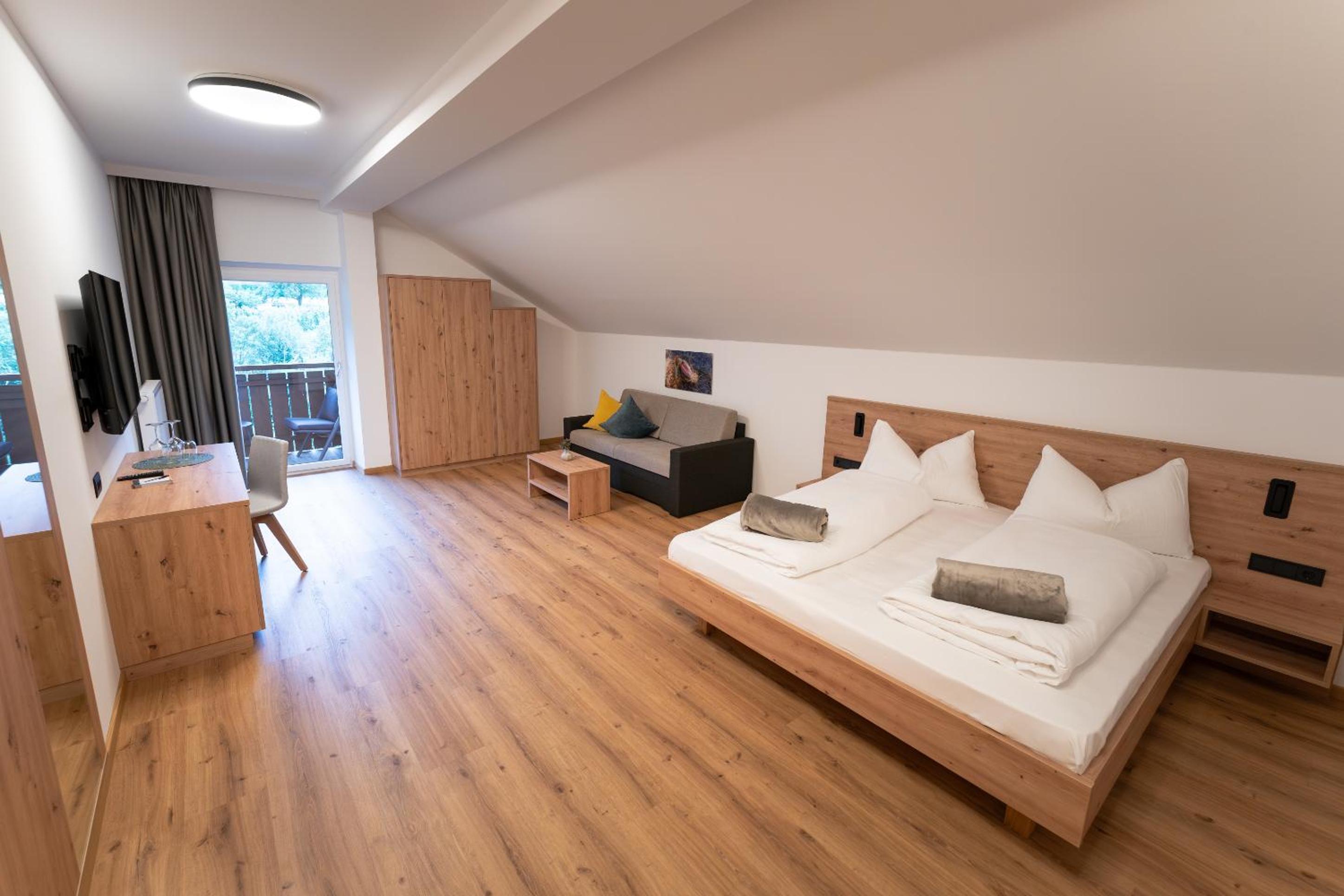 Quadruple Room with Balcony and Garden View photo 1