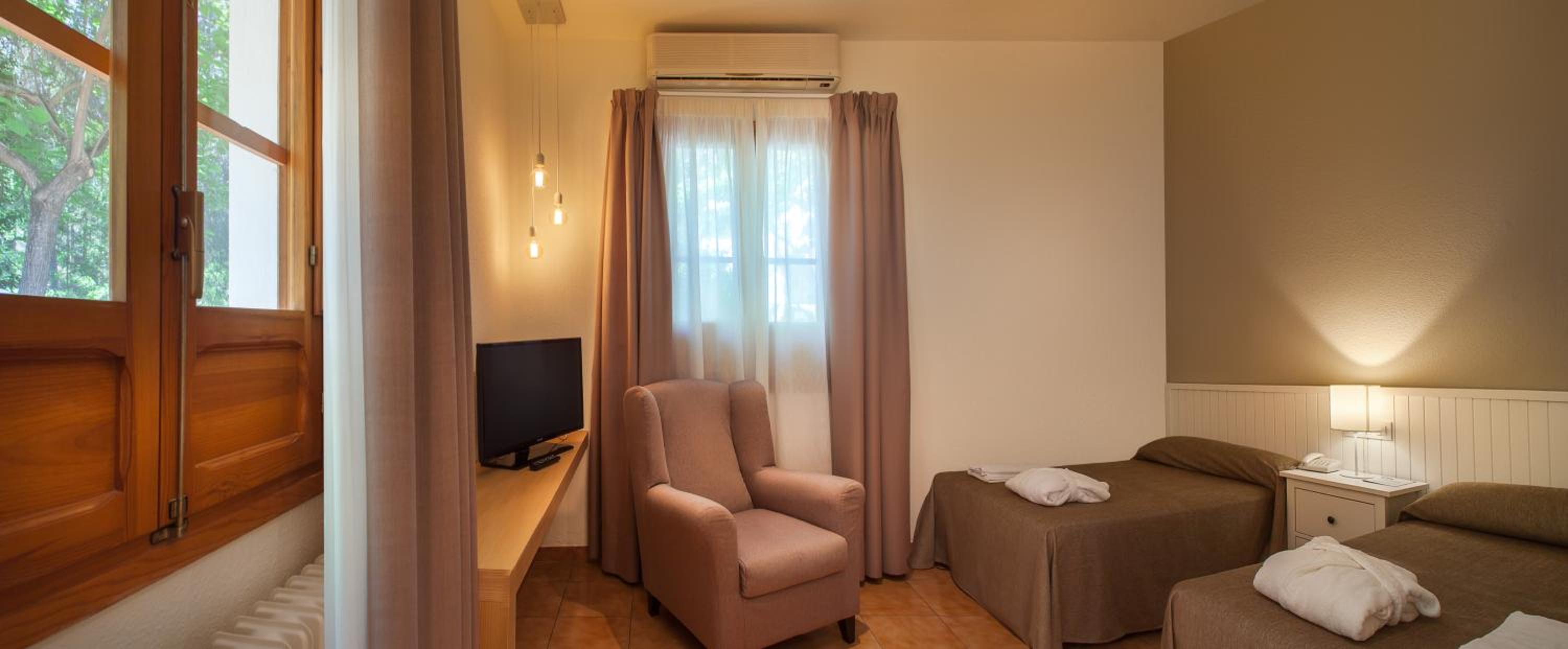 Habitación Doble (1 Adulto + 1 Niño)