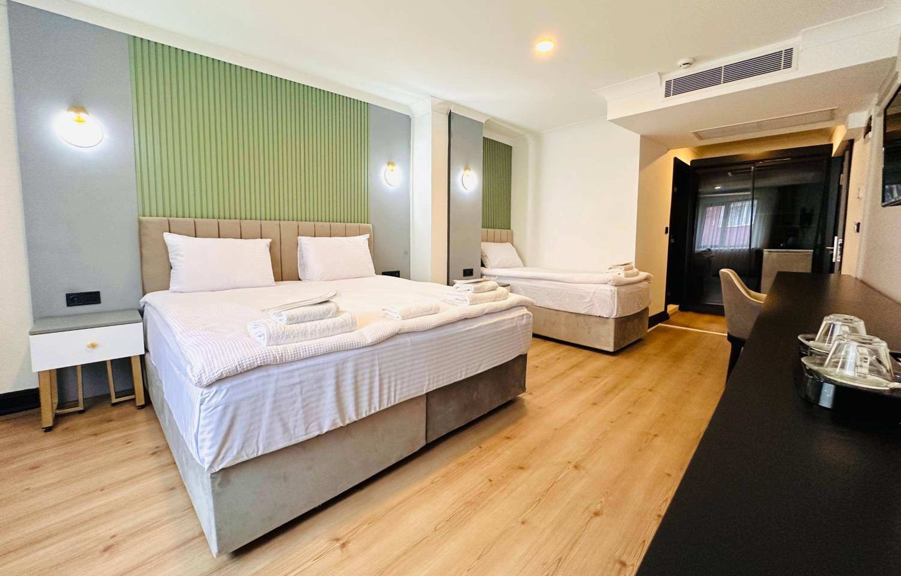 Triple Room - Photo 1