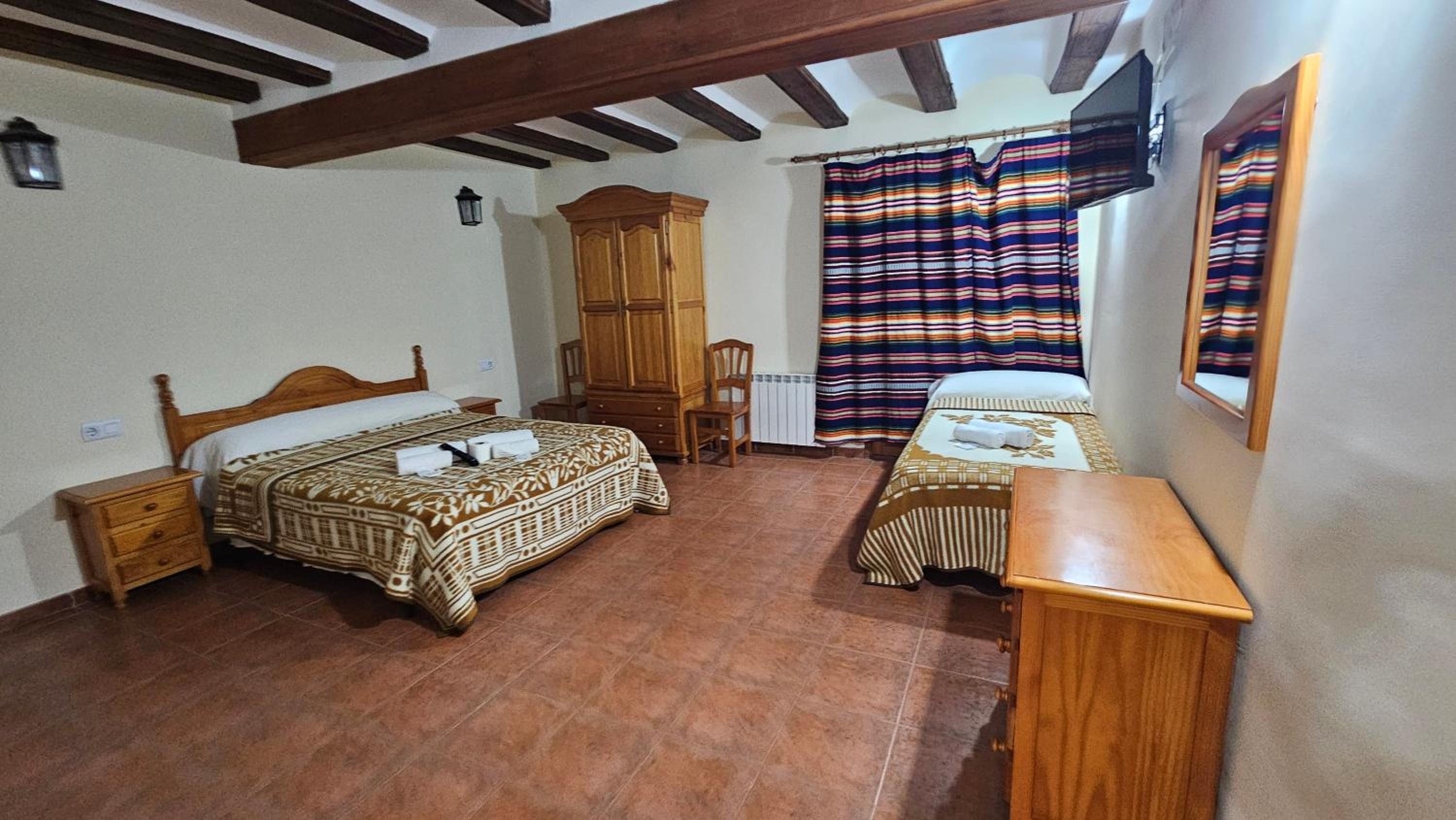Habitación Triple con Balcón