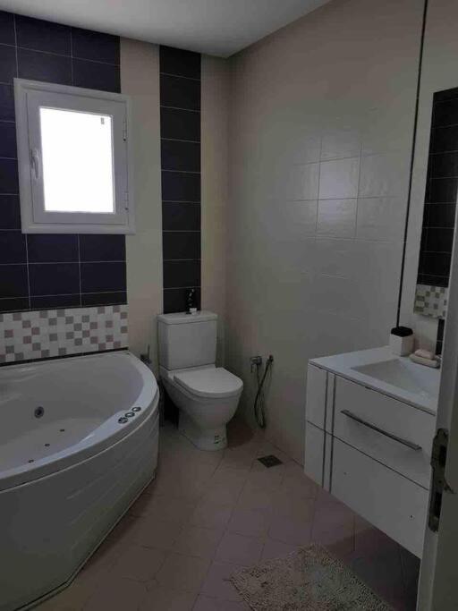Three-Bedroom Apartment photo 2