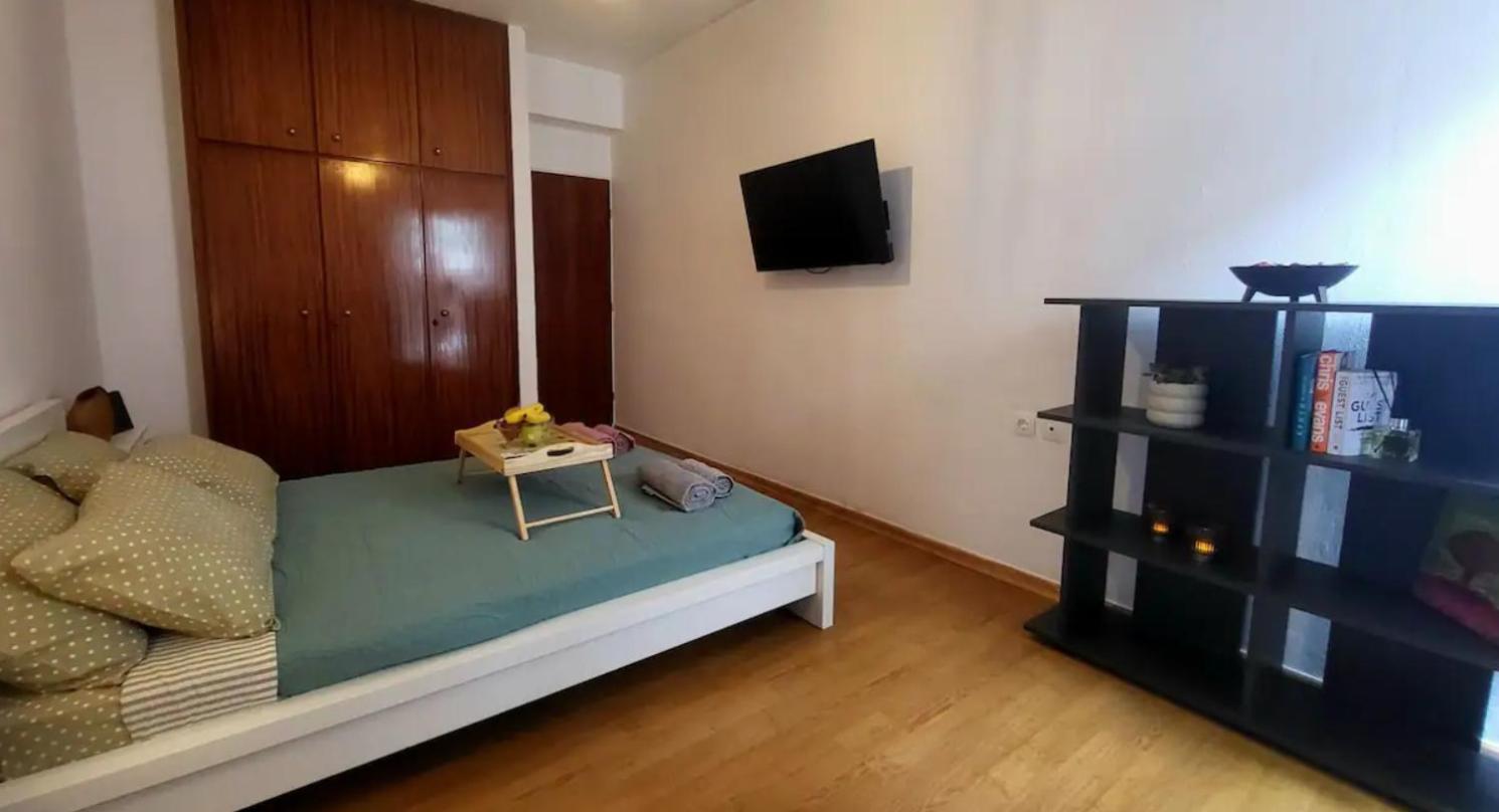 One-Bedroom Apartment with Balcony and City View
