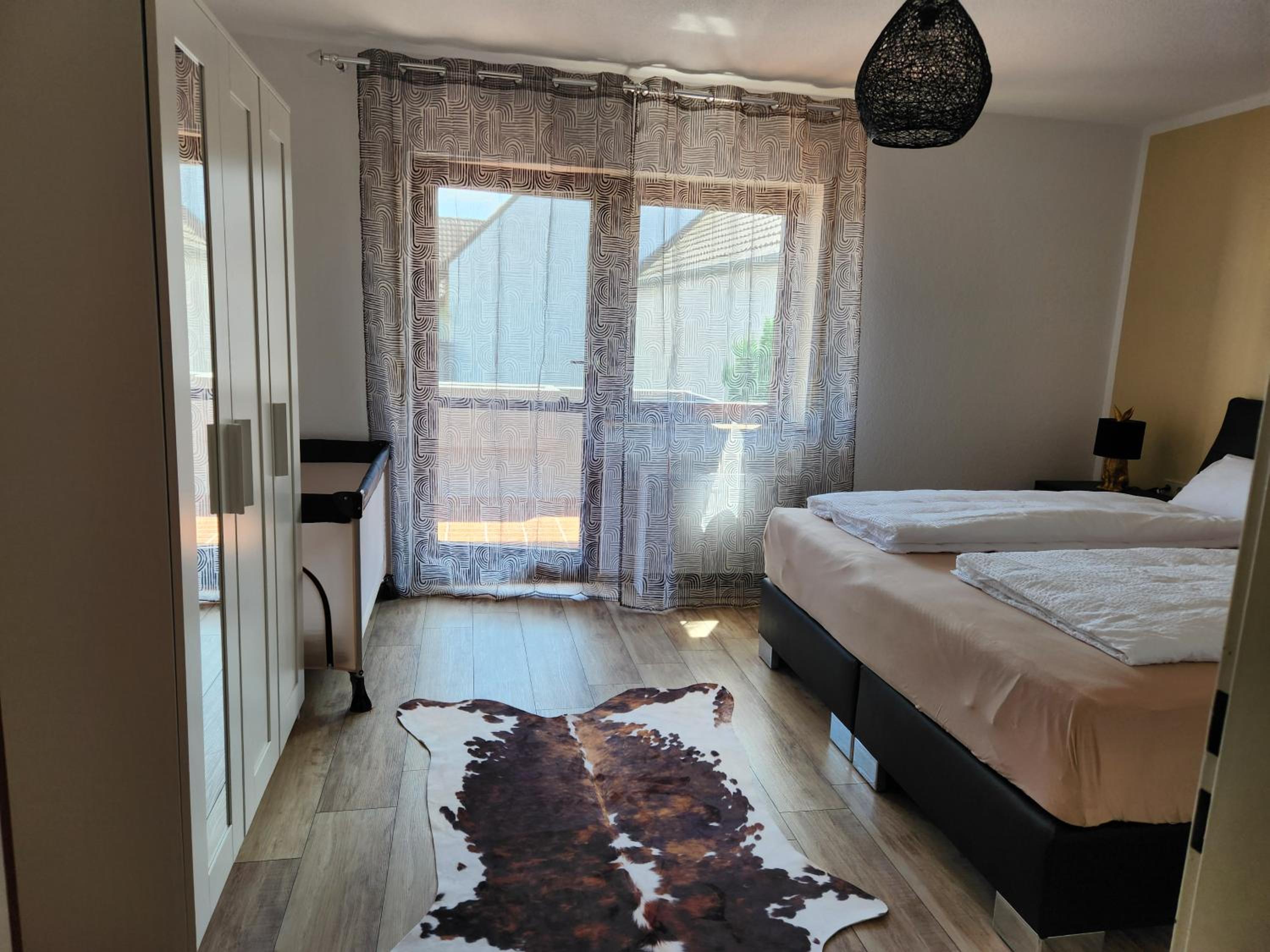 Three-Bedroom Apartment with Balcony photo 1