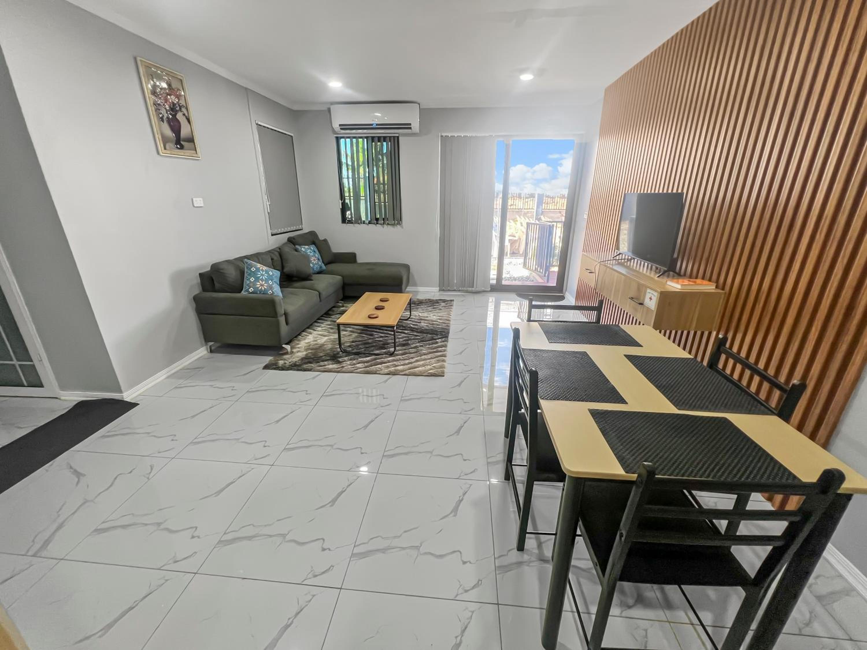 Three-Bedroom Apartment photo 1