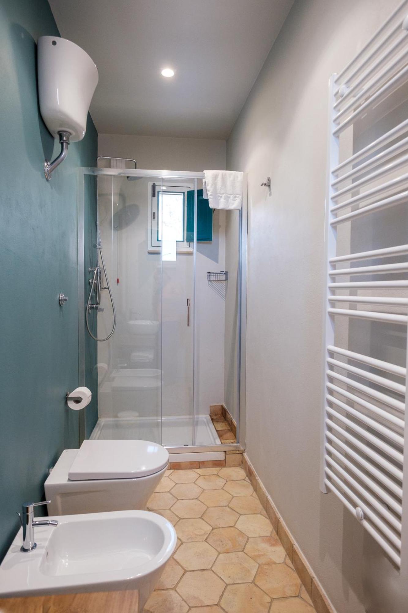 Deluxe Triple Room - Photo 8