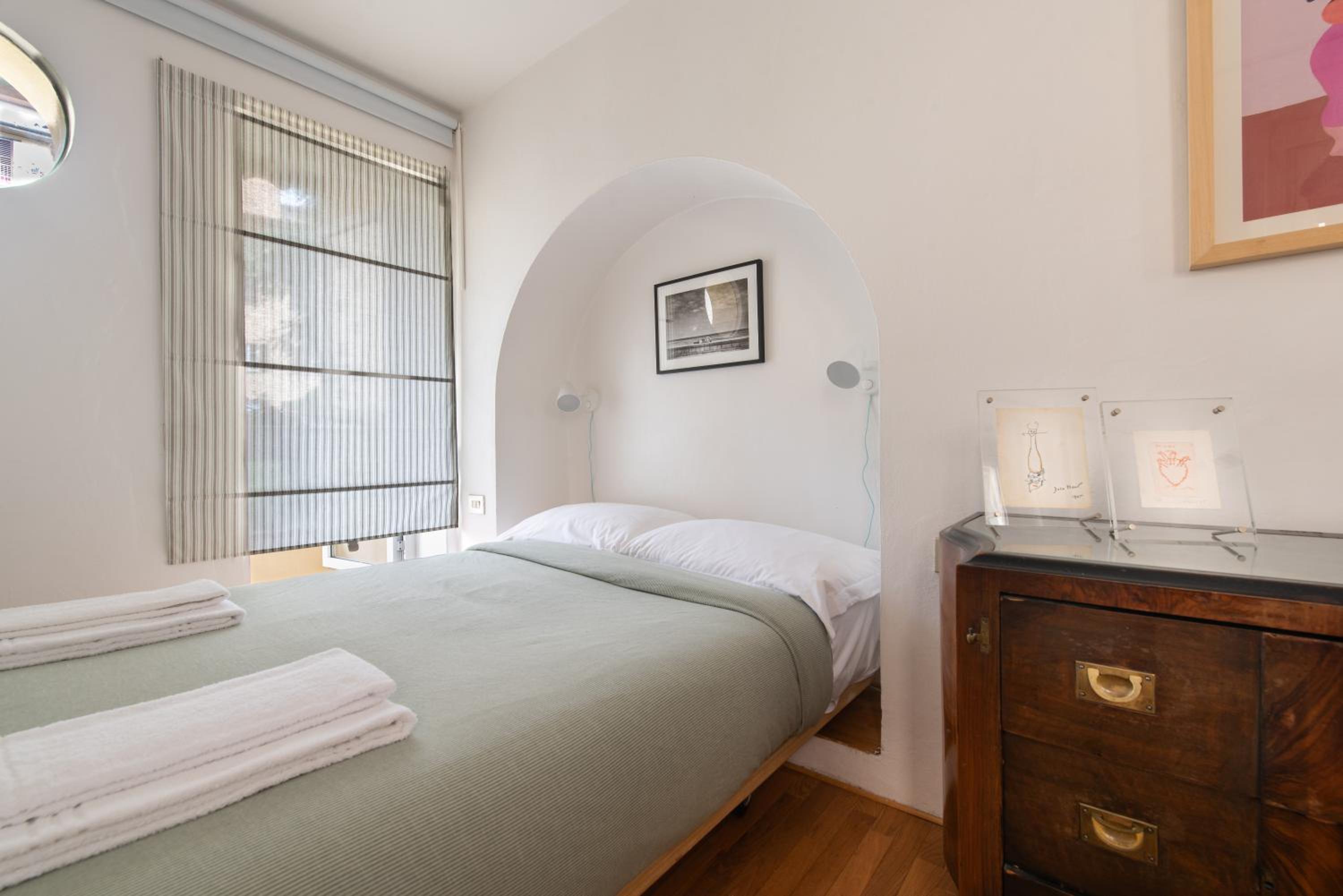 One-Bedroom Apartment with Balcony and City View