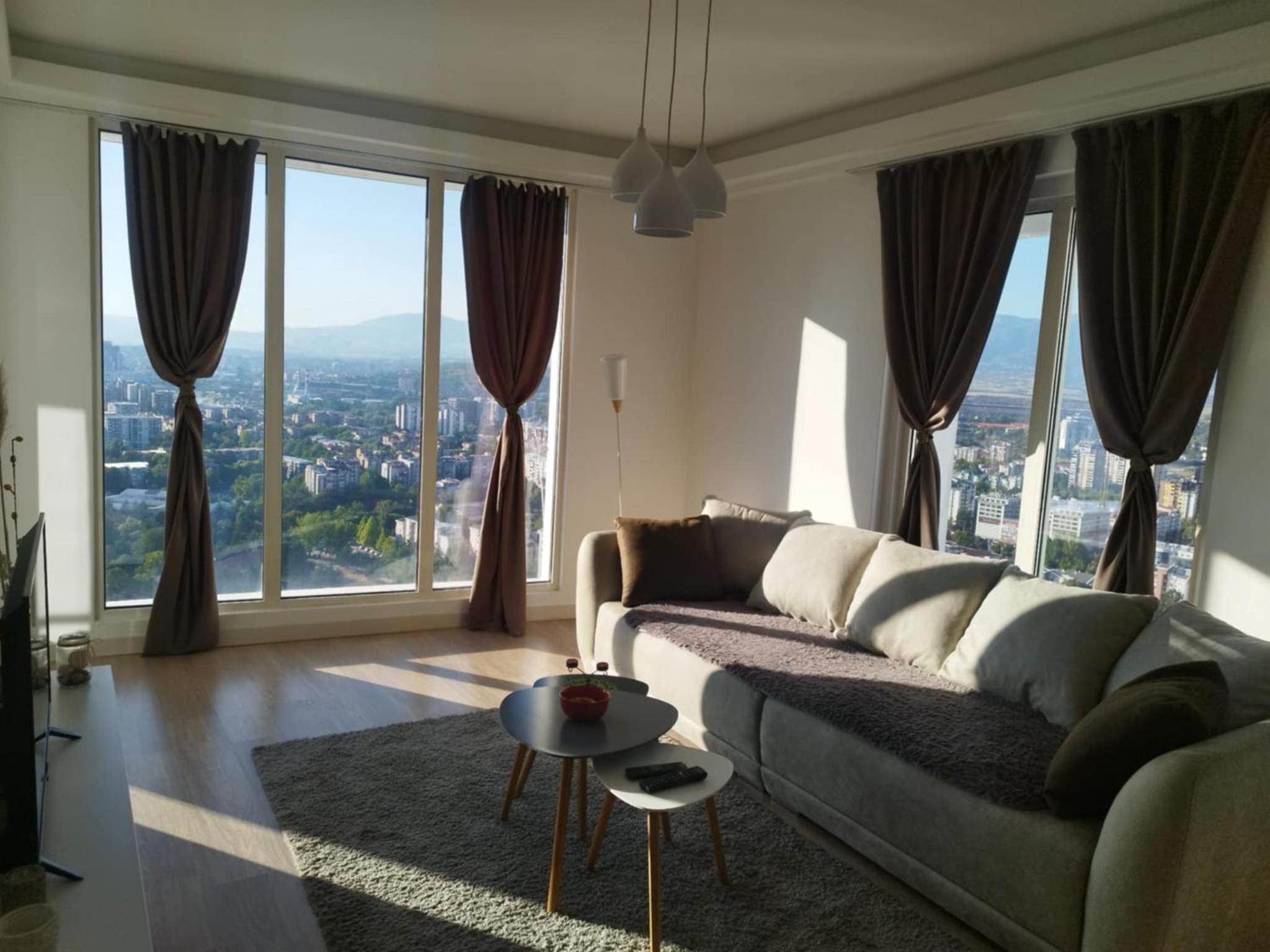 One-Bedroom Apartment with Balcony and City View photo 1