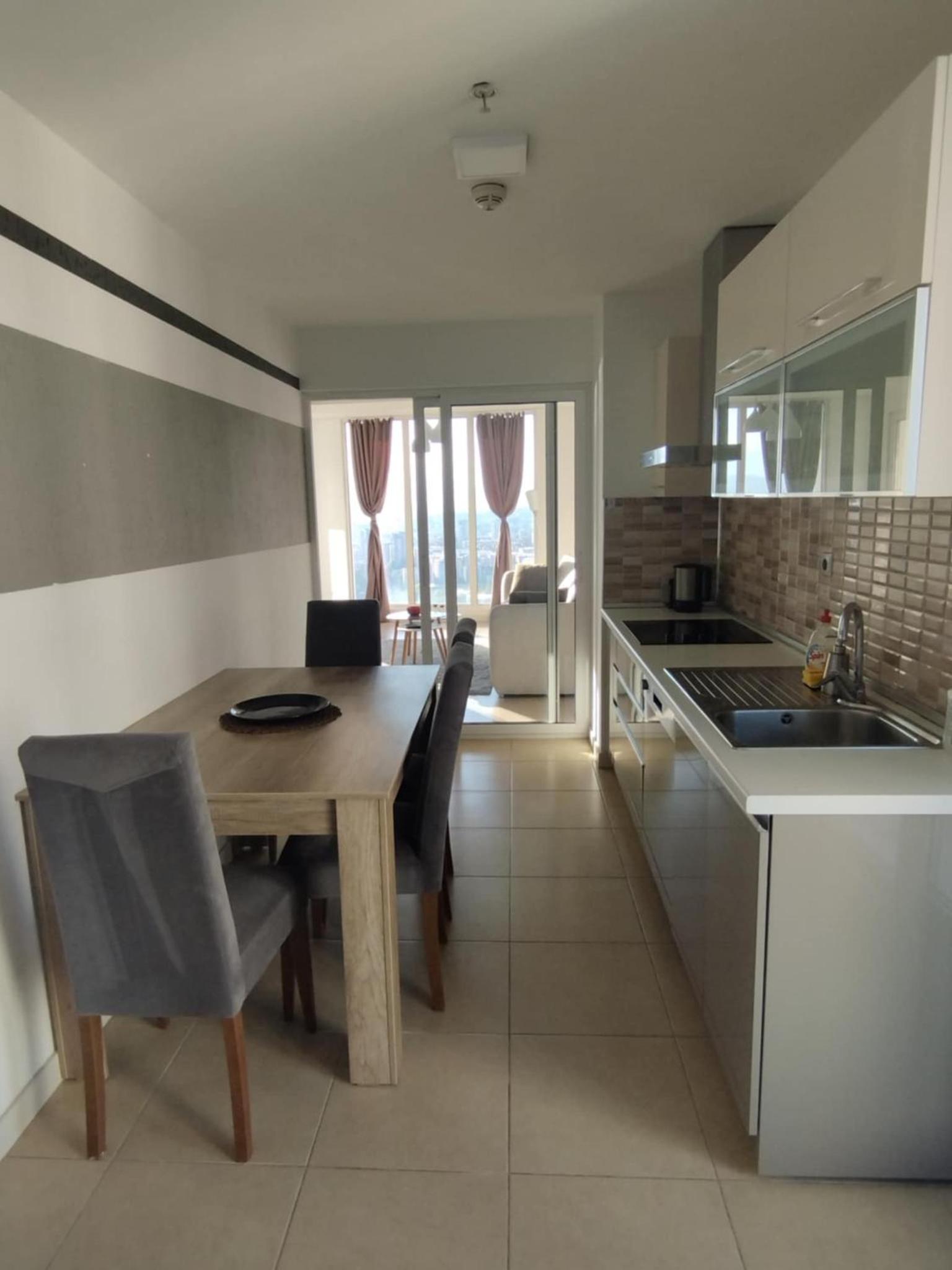 One-Bedroom Apartment with Balcony and City View photo 3
