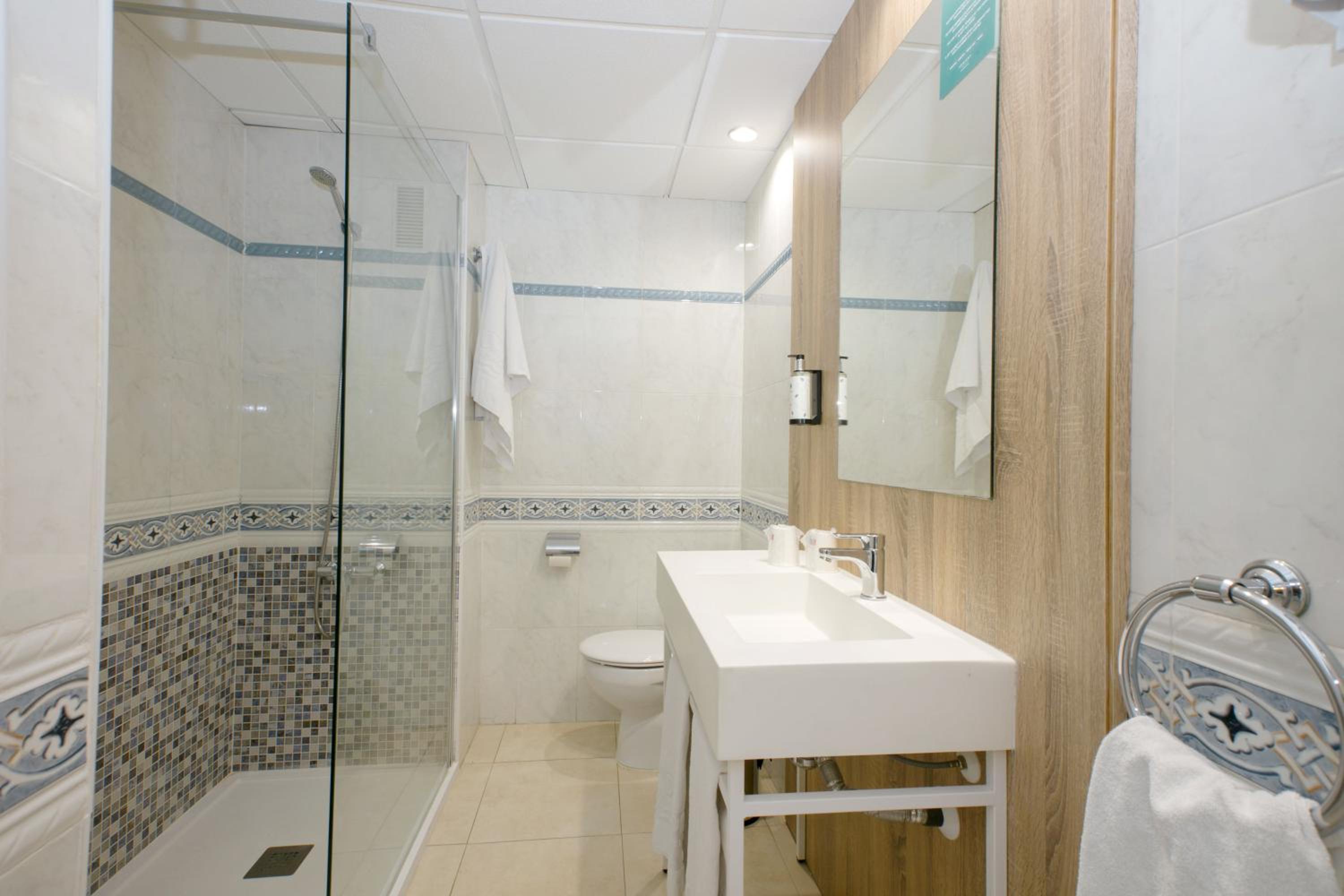 Relax in style with our modern, serene bathroom retreat.