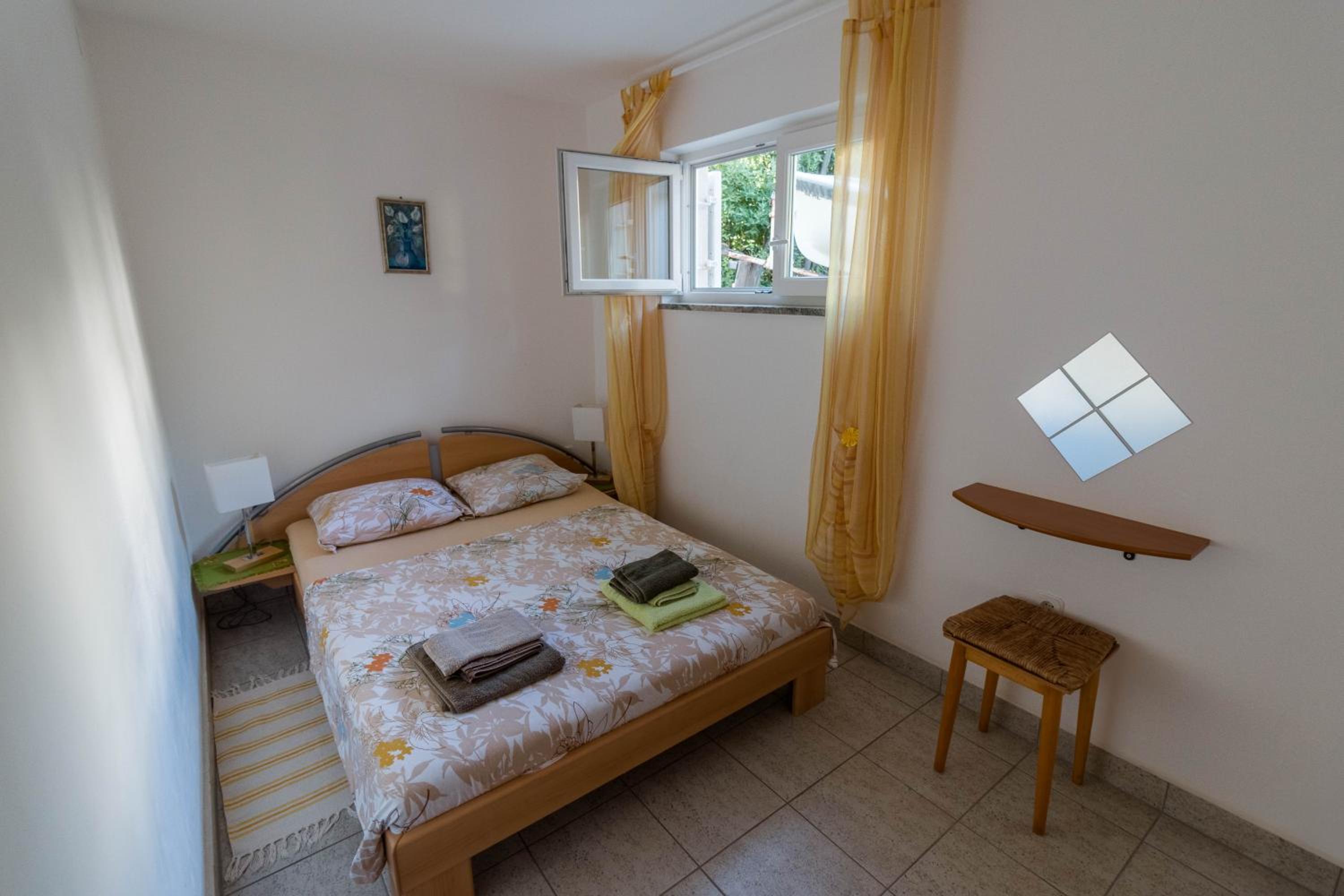 One-Bedroom Apartment with Terrace and Garden View