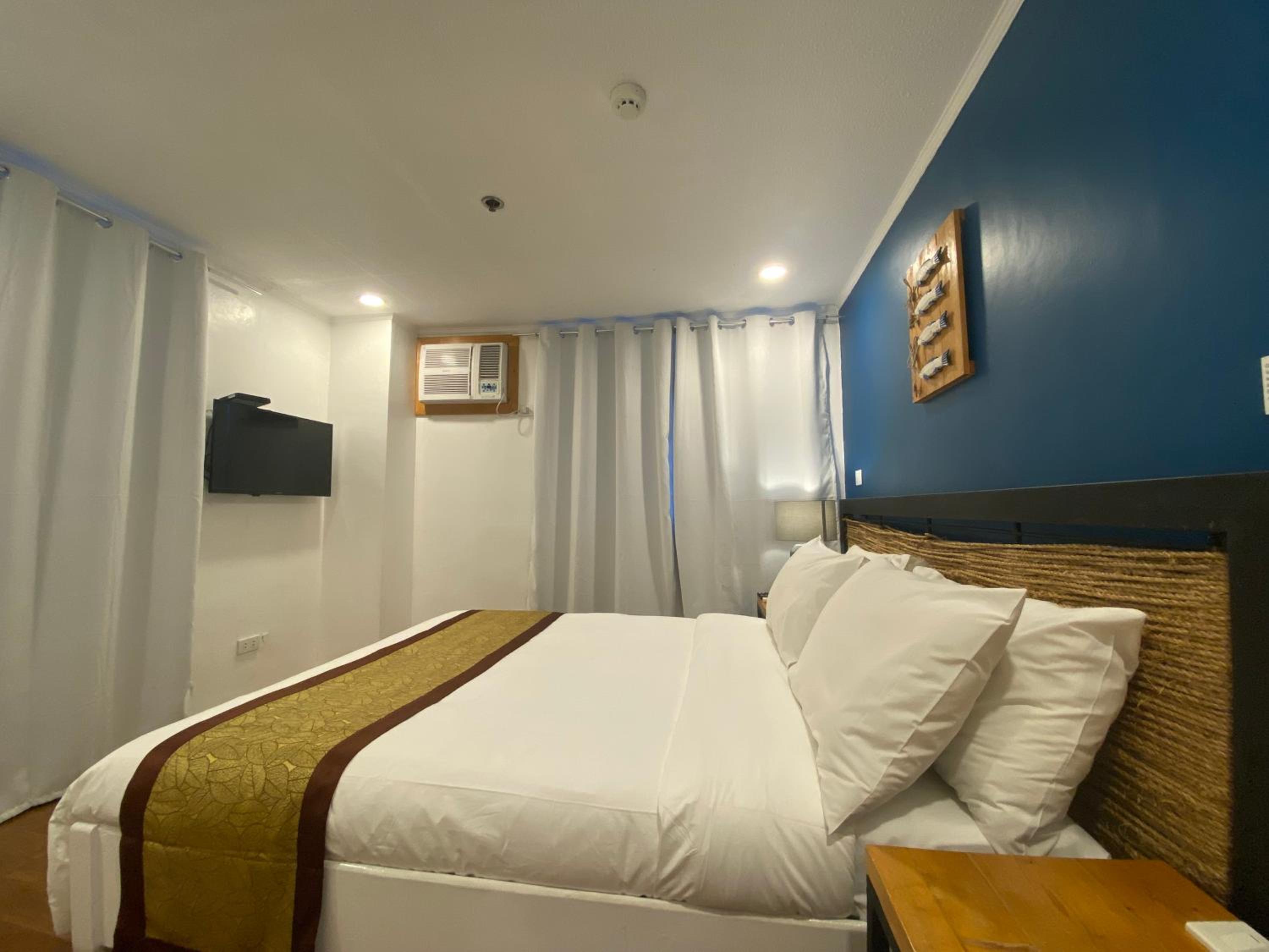 Deluxe Room - Photo 1