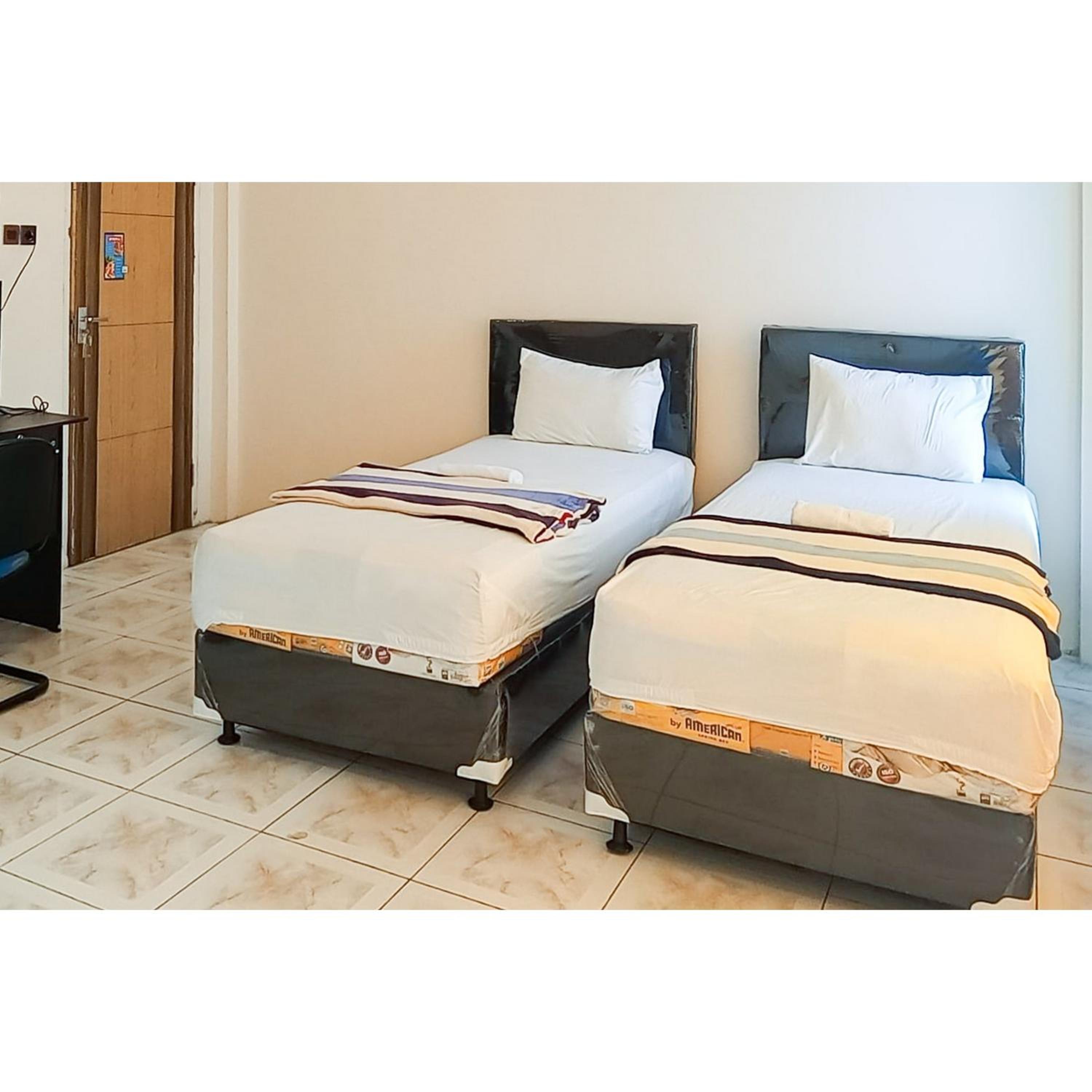 Standard Twin Room - Photo 4