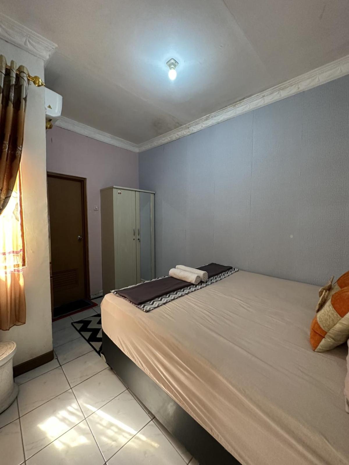 Three-Bedroom House photo 2