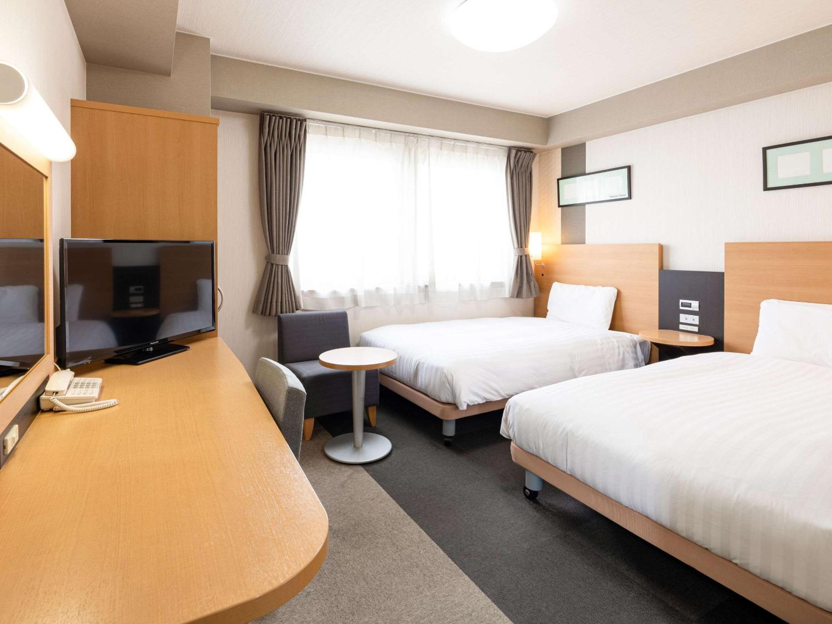 Twin Room - Non-Smoking - Photo 6