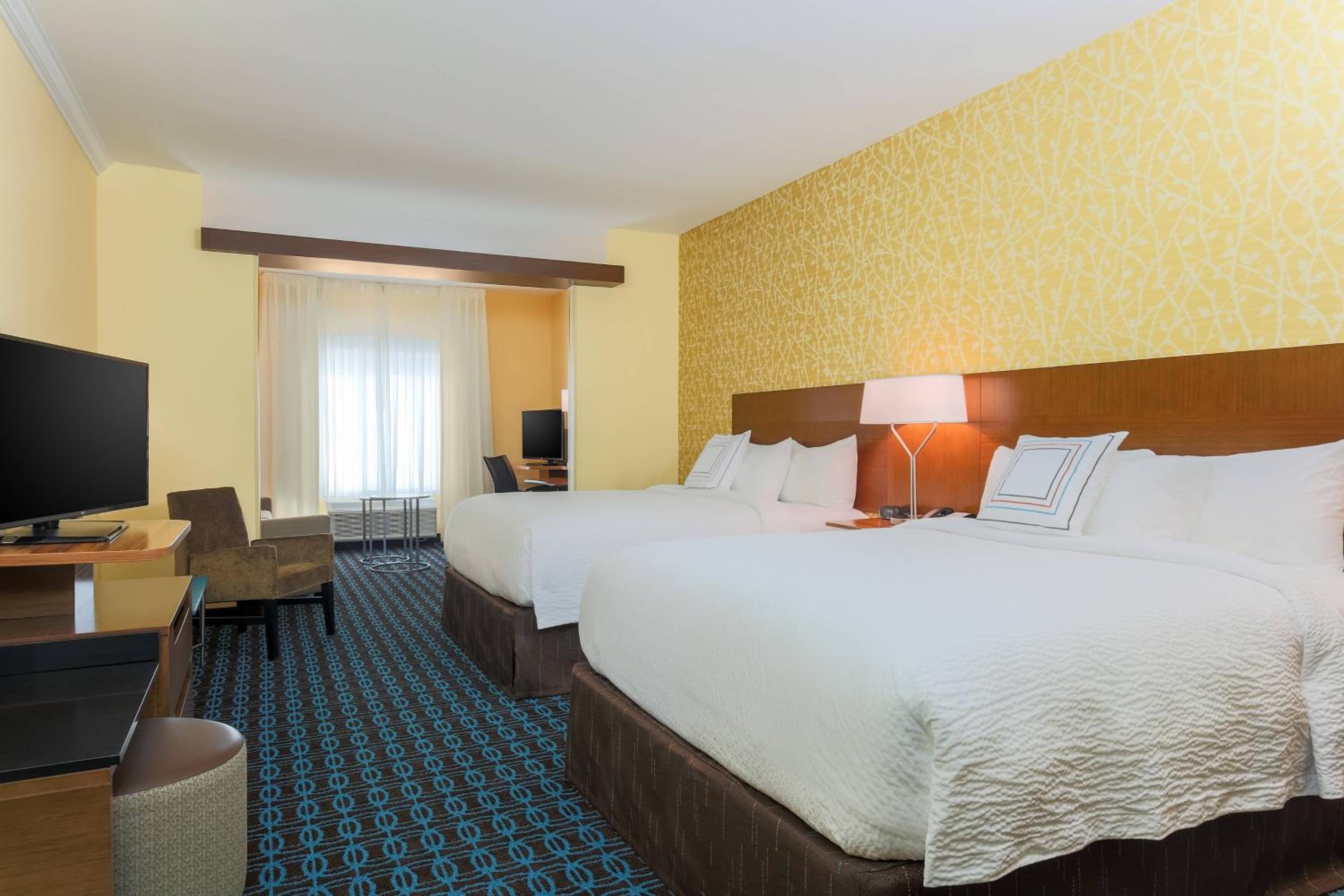 Queen Suite with 2 Queen Beds and Sofa Bed