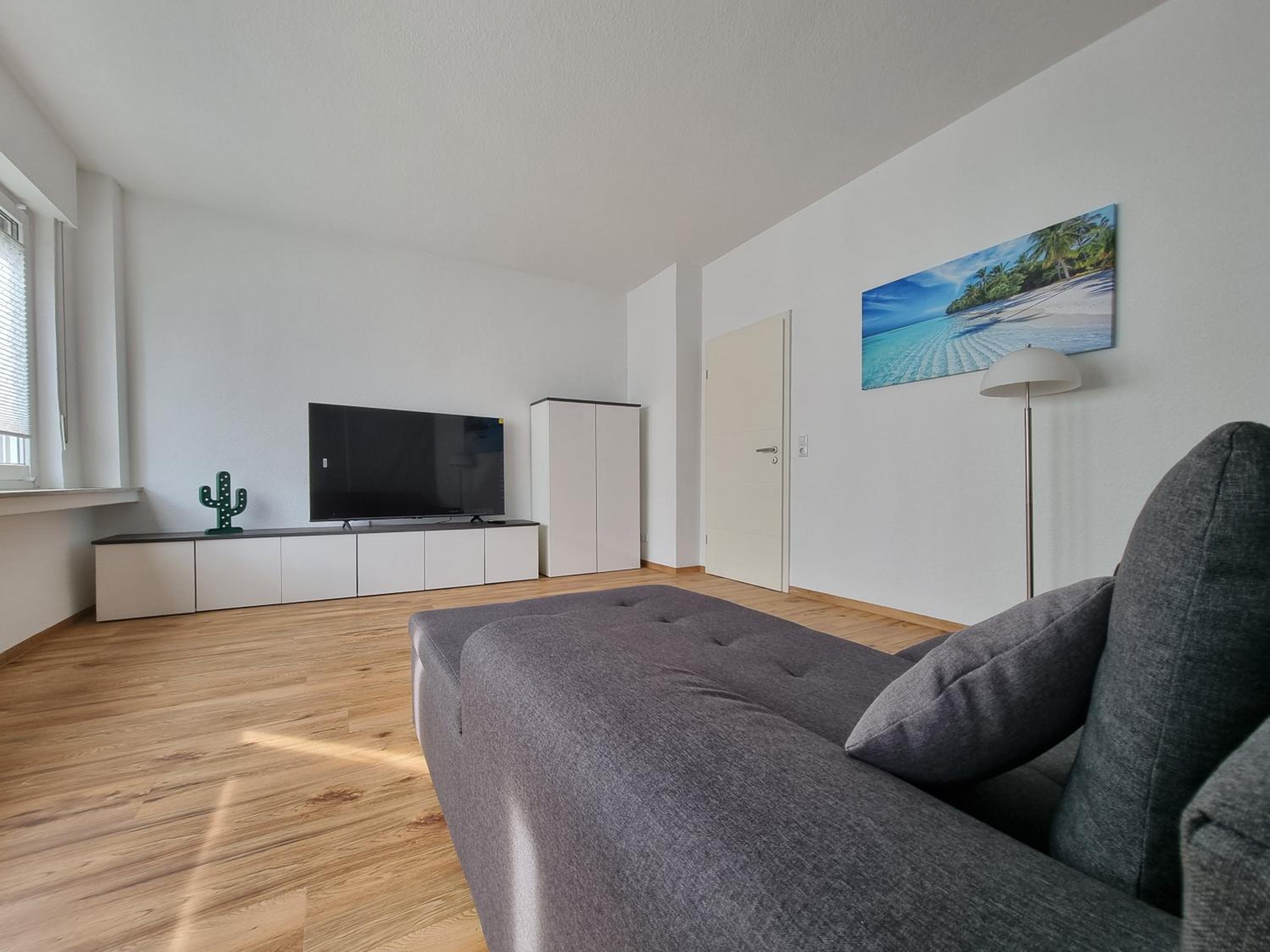 Four-Bedroom Apartment with Balcony  photo 1