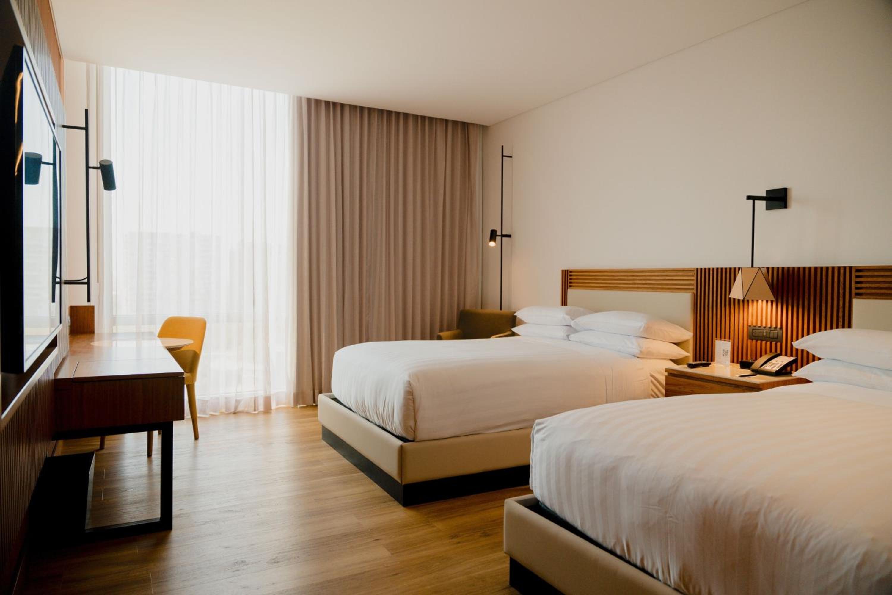 Queen Room with Two Queen Beds - Photo 2