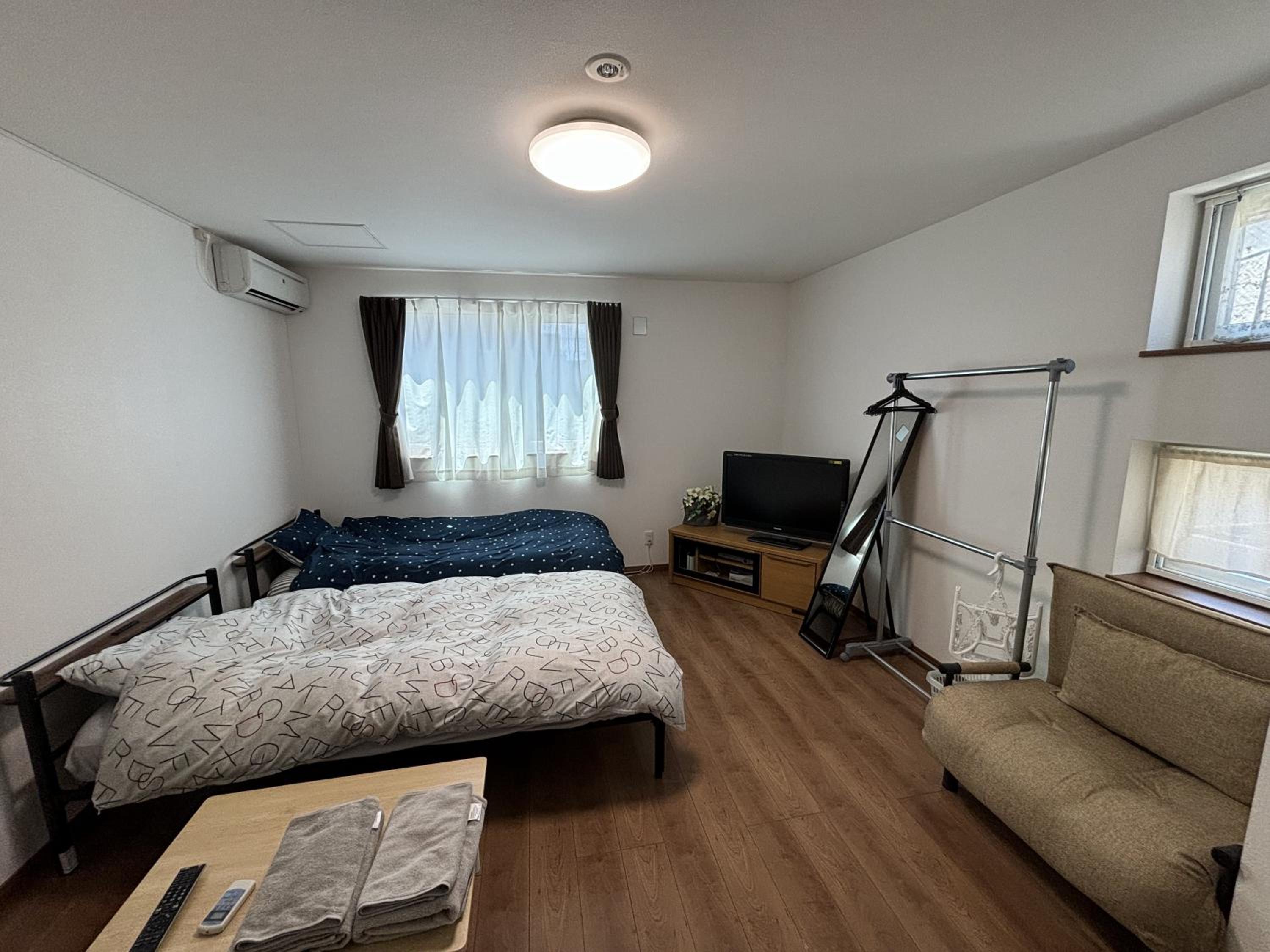 Twin Room with Extra Bed - Photo 1