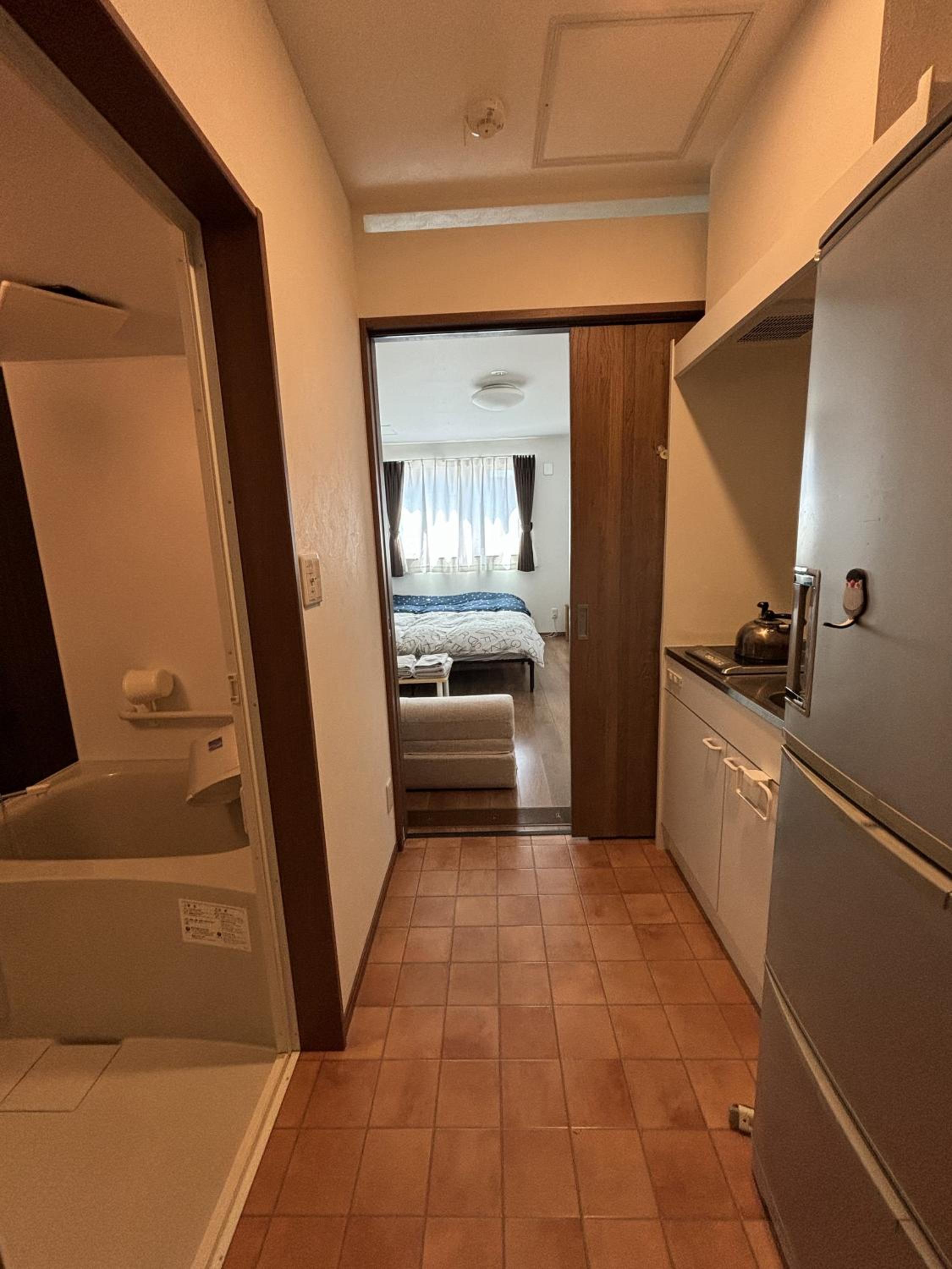 Twin Room with Extra Bed - Photo 7