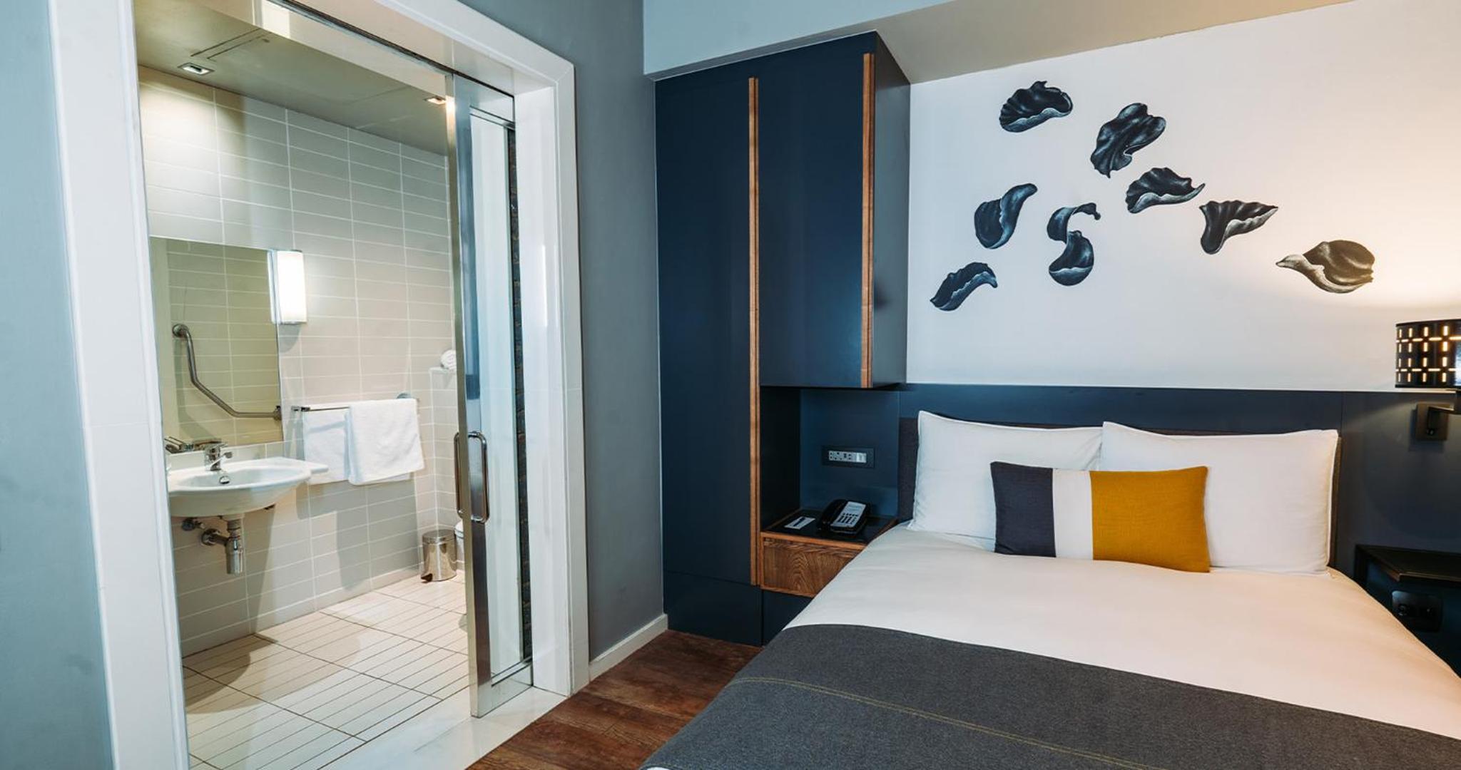 Contemporary Open Plan Room One Queen Bed Paraplegic photo 2