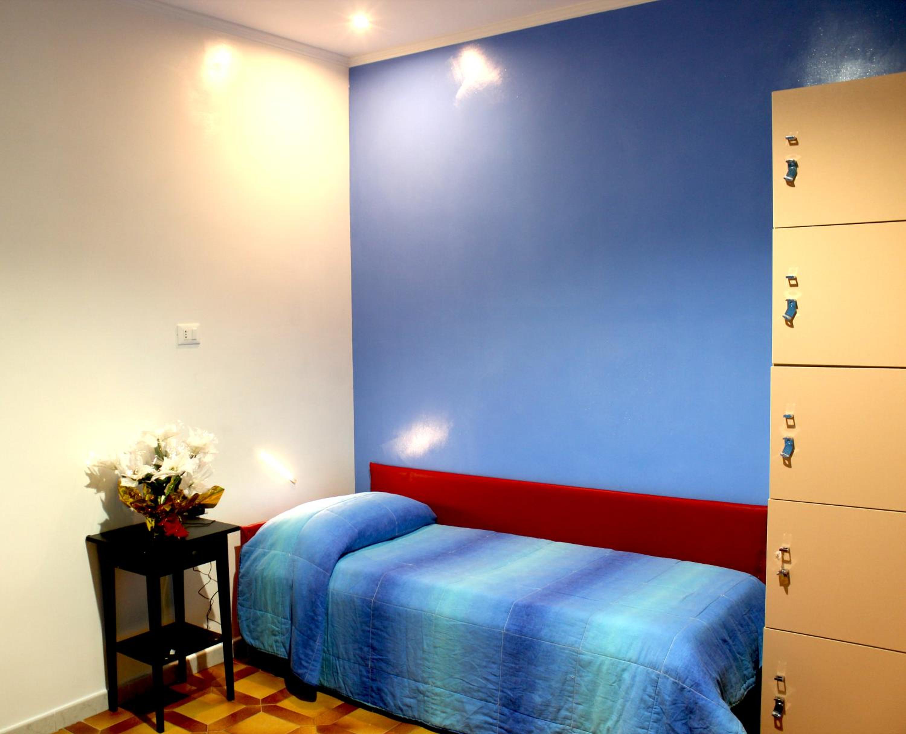 Economy Quadruple Room with Shared Bathroom