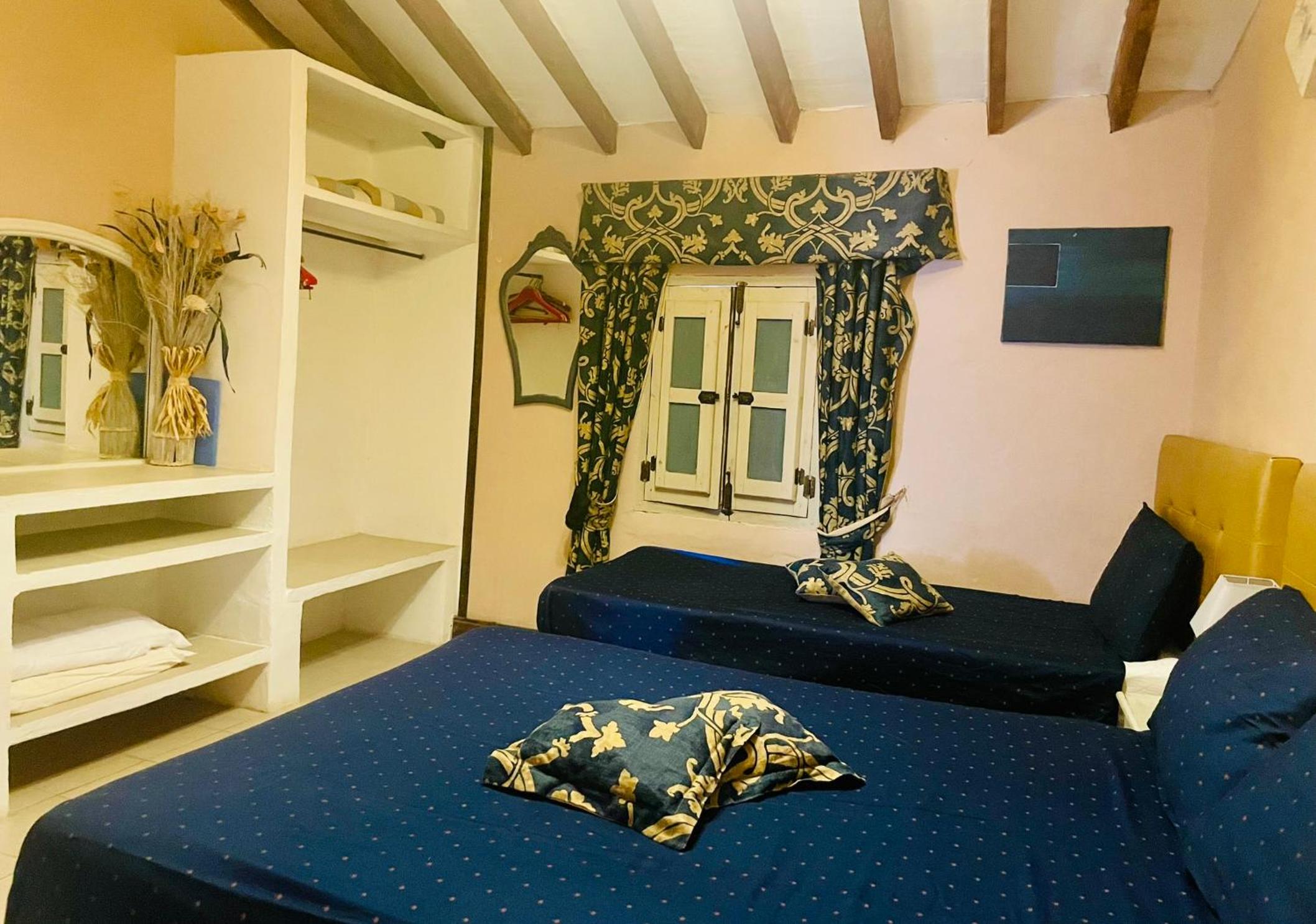 Habitación familiar con baño privado