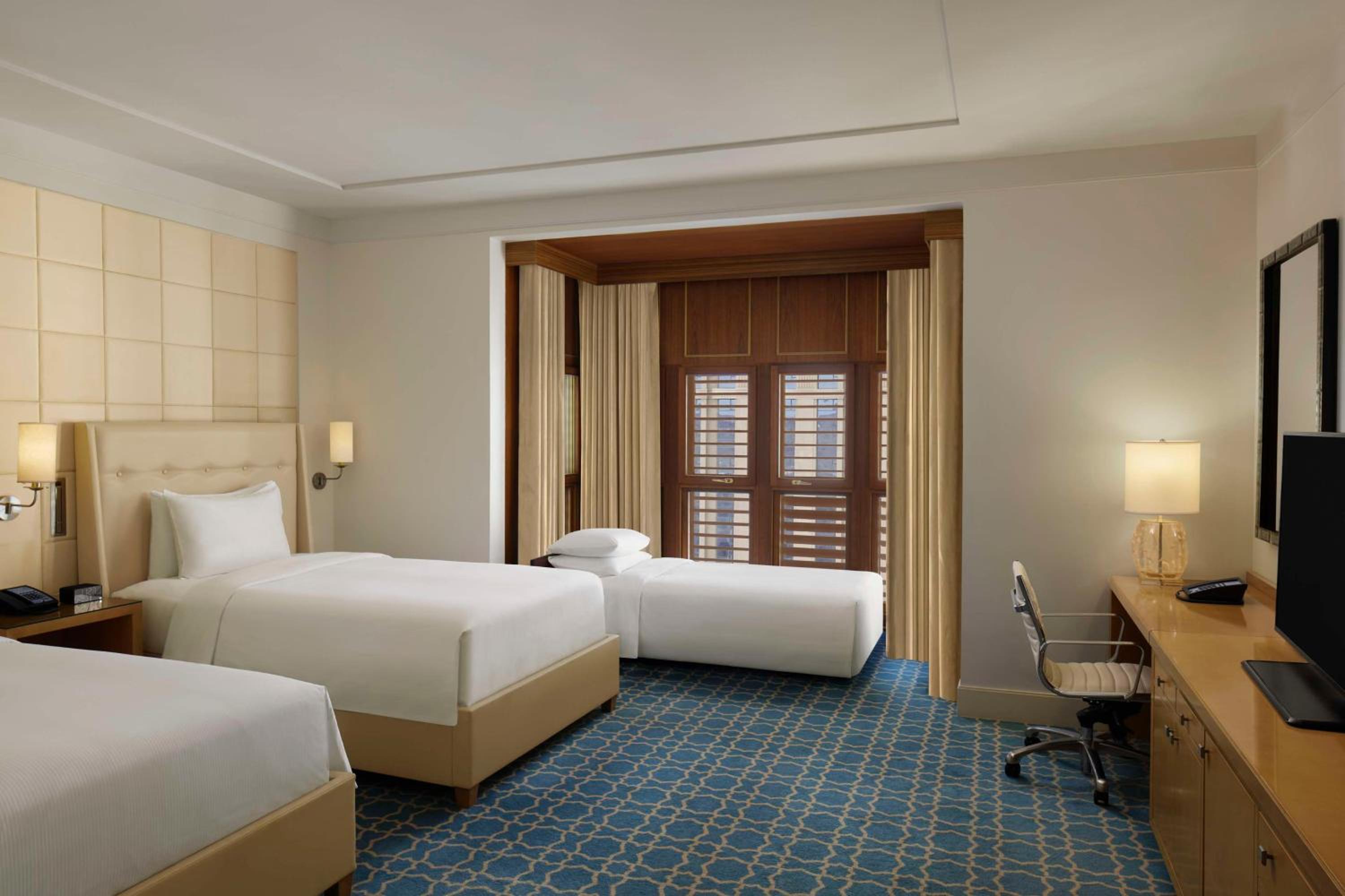 Deluxe Room with Three Single Beds with Partial Haram View