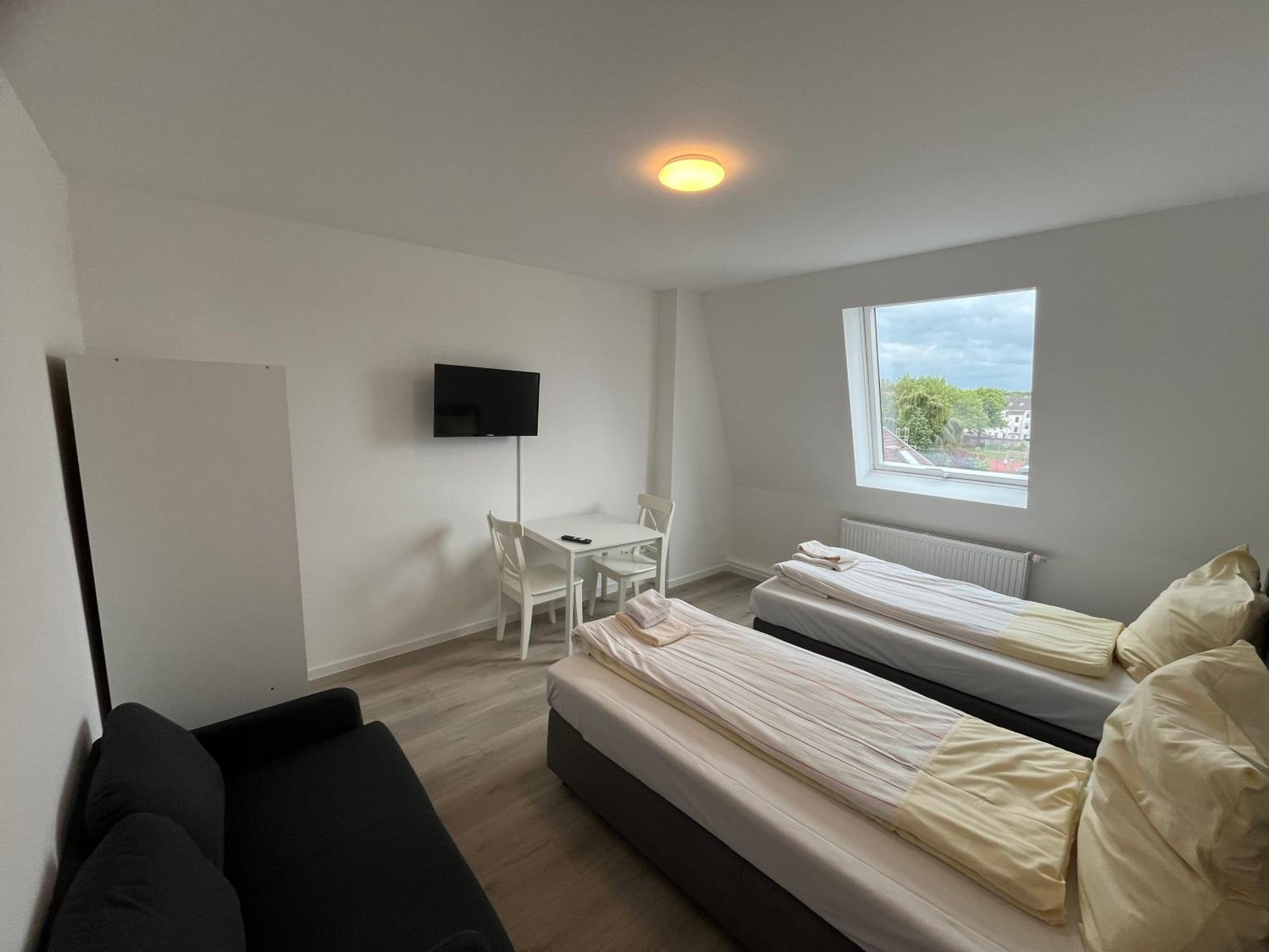 Three-Bedroom Apartment photo 2
