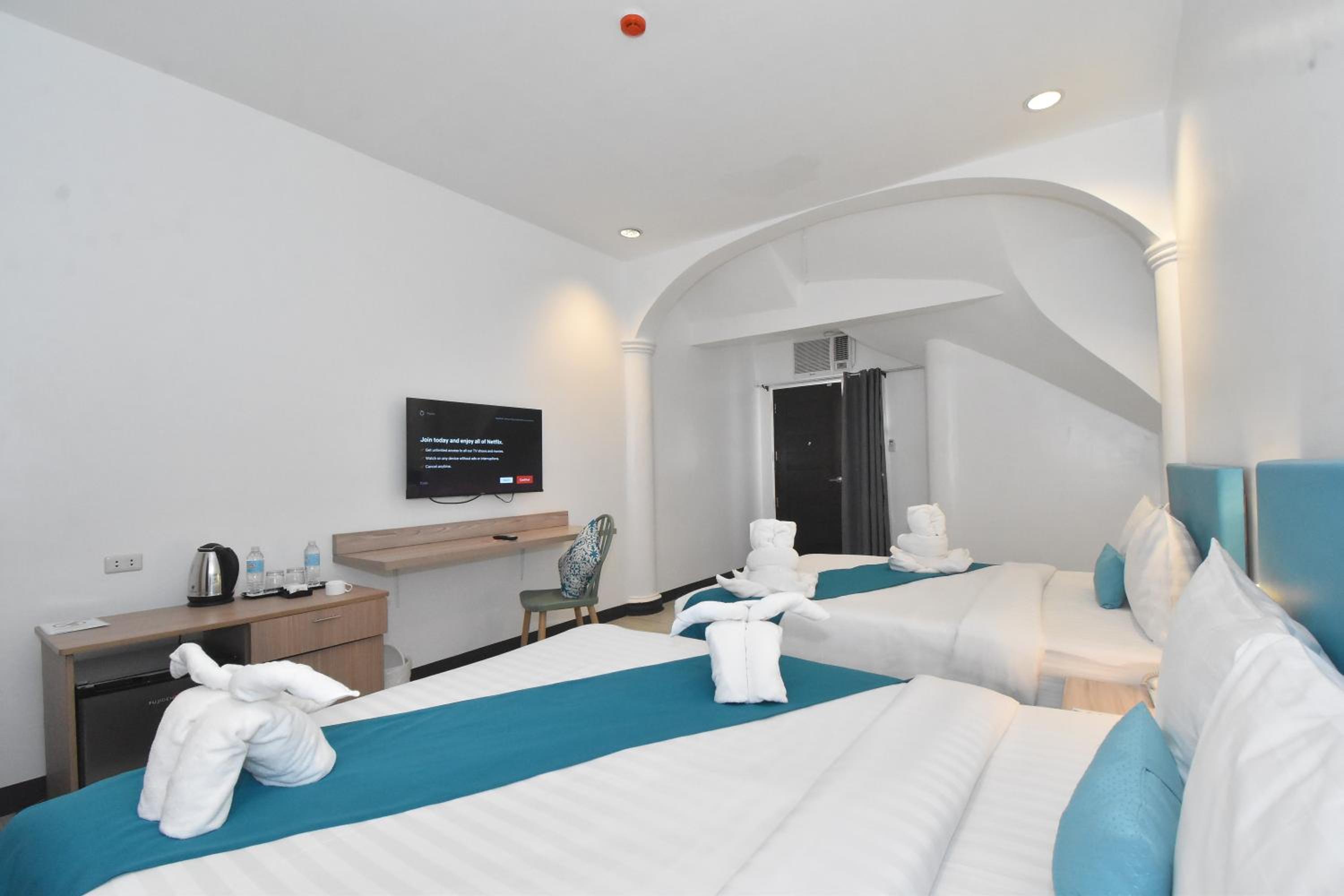Premium Quadruple Room - Photo 10