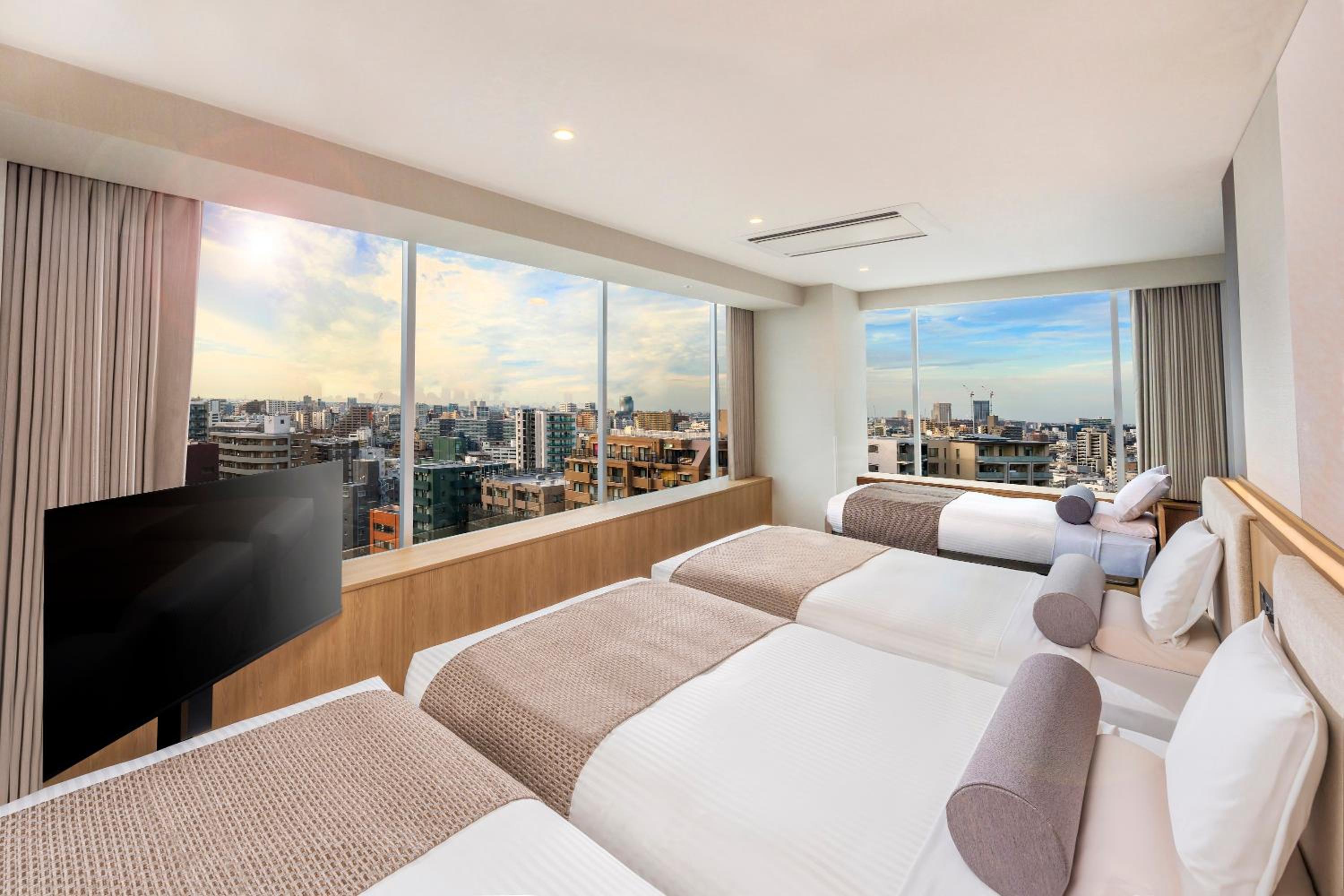 House Keeping is Optional with Additional Cost - Triple Room with Sky View - Non-Smoking photo 2