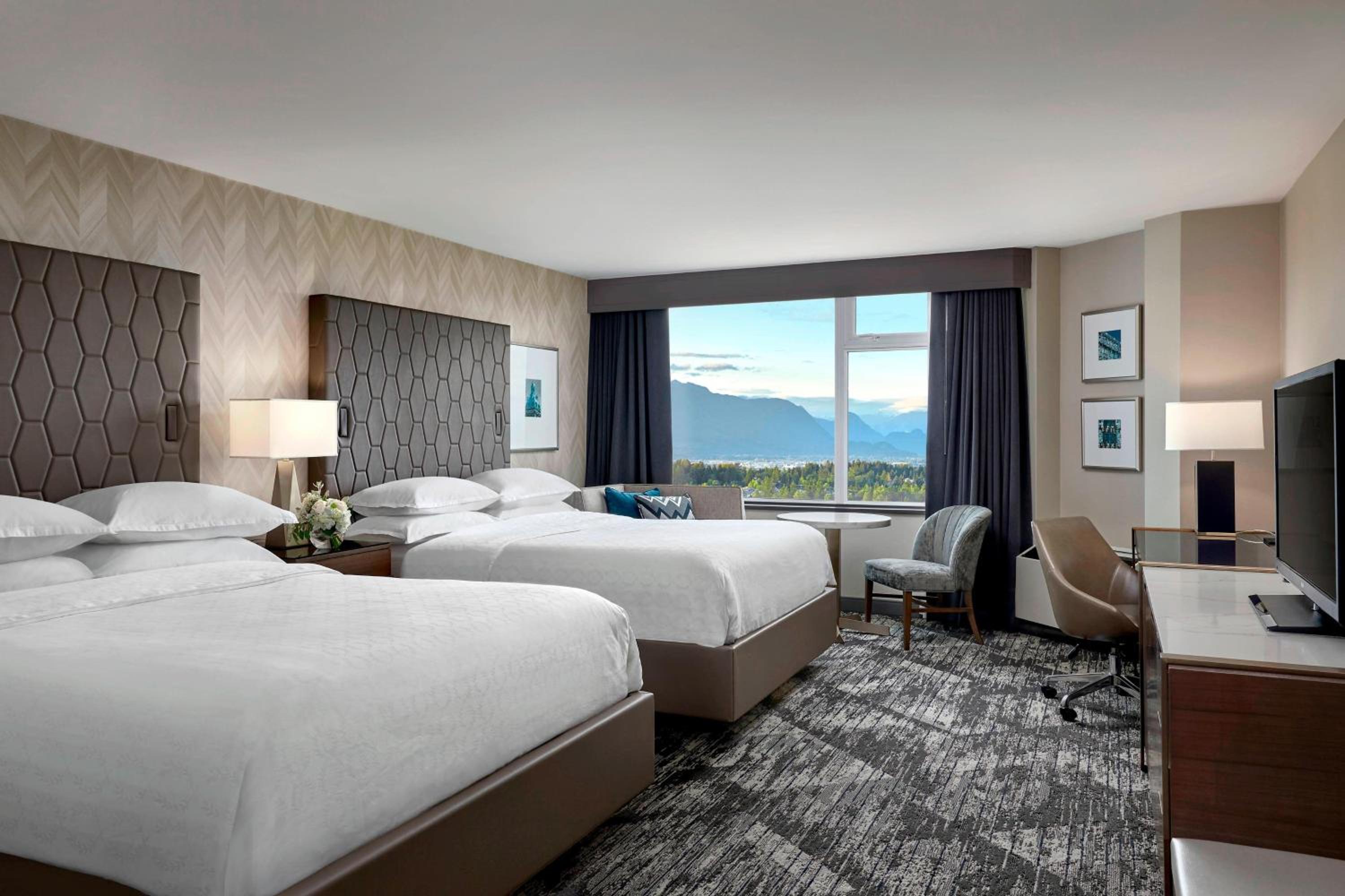Deluxe Queen Room with Two Queen Beds - Photo 1