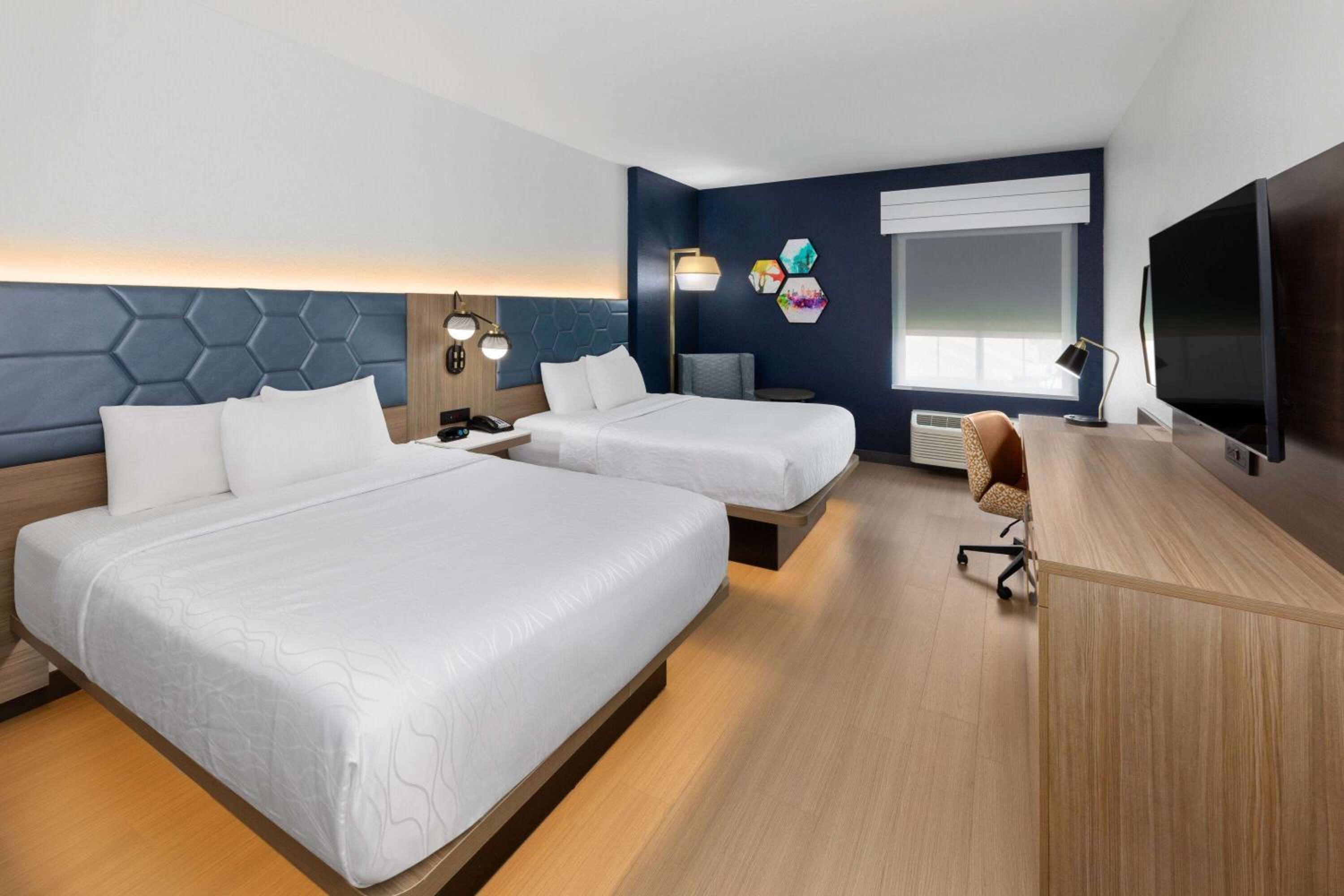 Deluxe Queen Room with Two Queen Beds - Photo 1