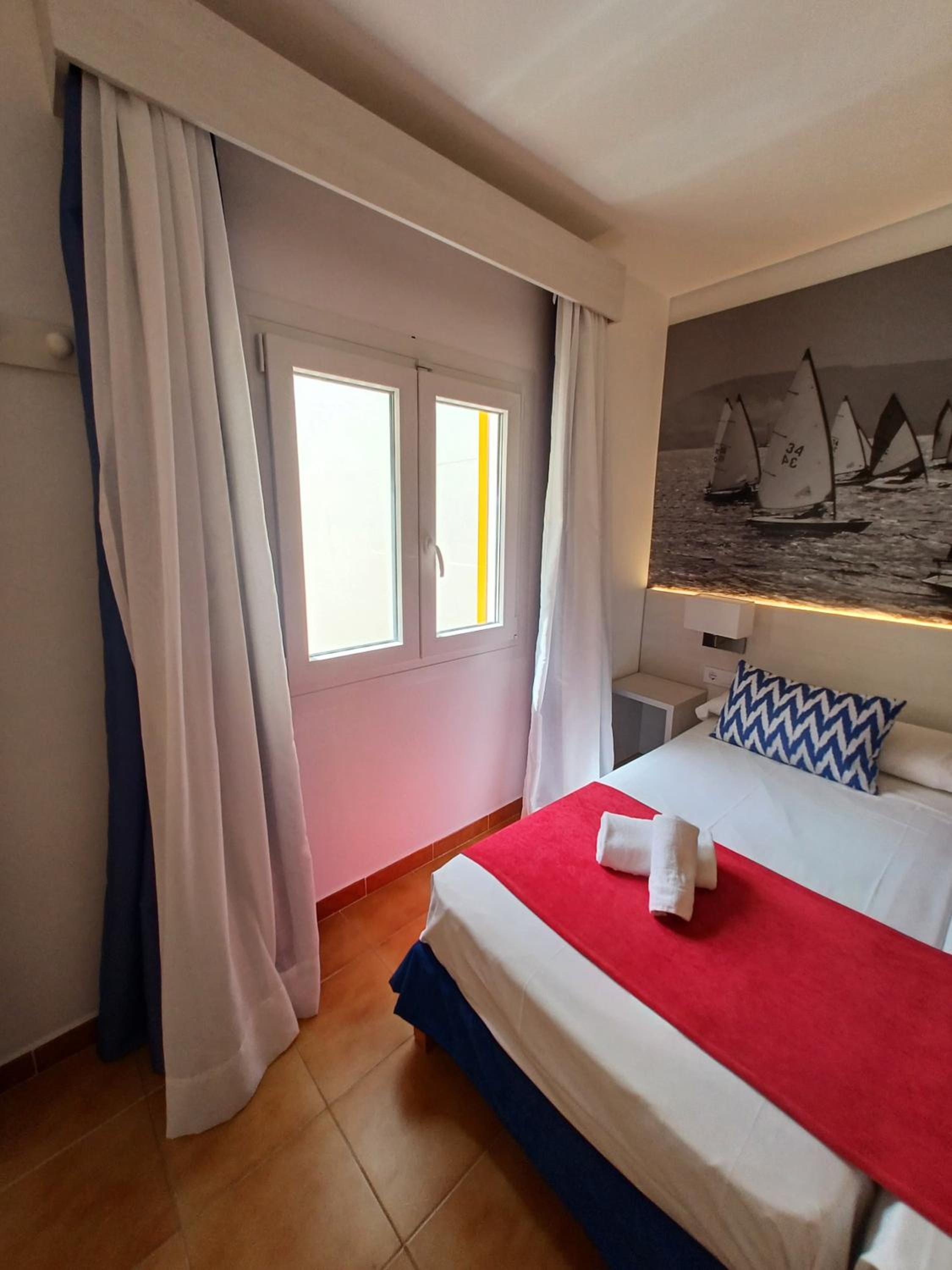 Habitación Triple con Aire Acondicionado