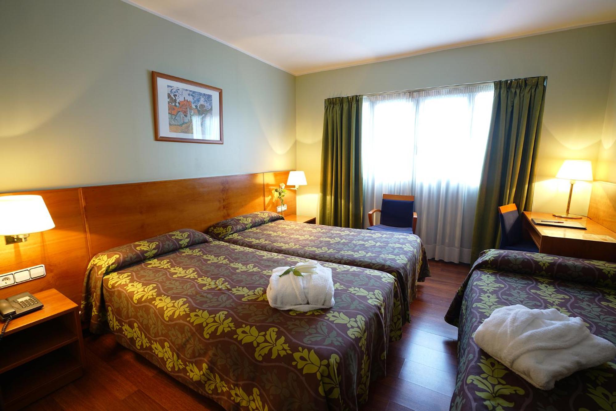 Triple Room (2 Adults + 1 Child)
