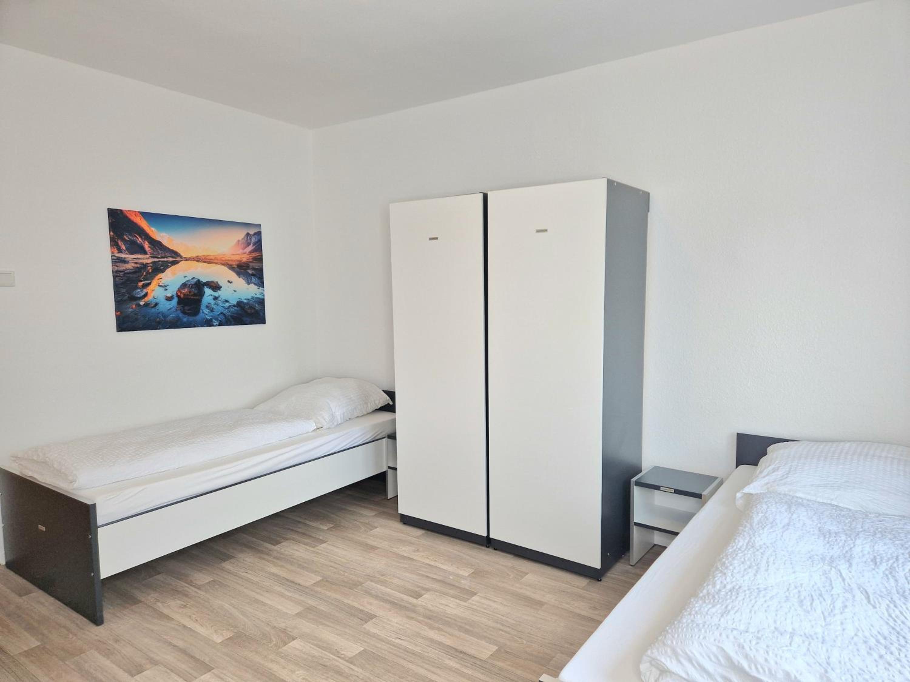 Three-Bedroom Apartment photo 1