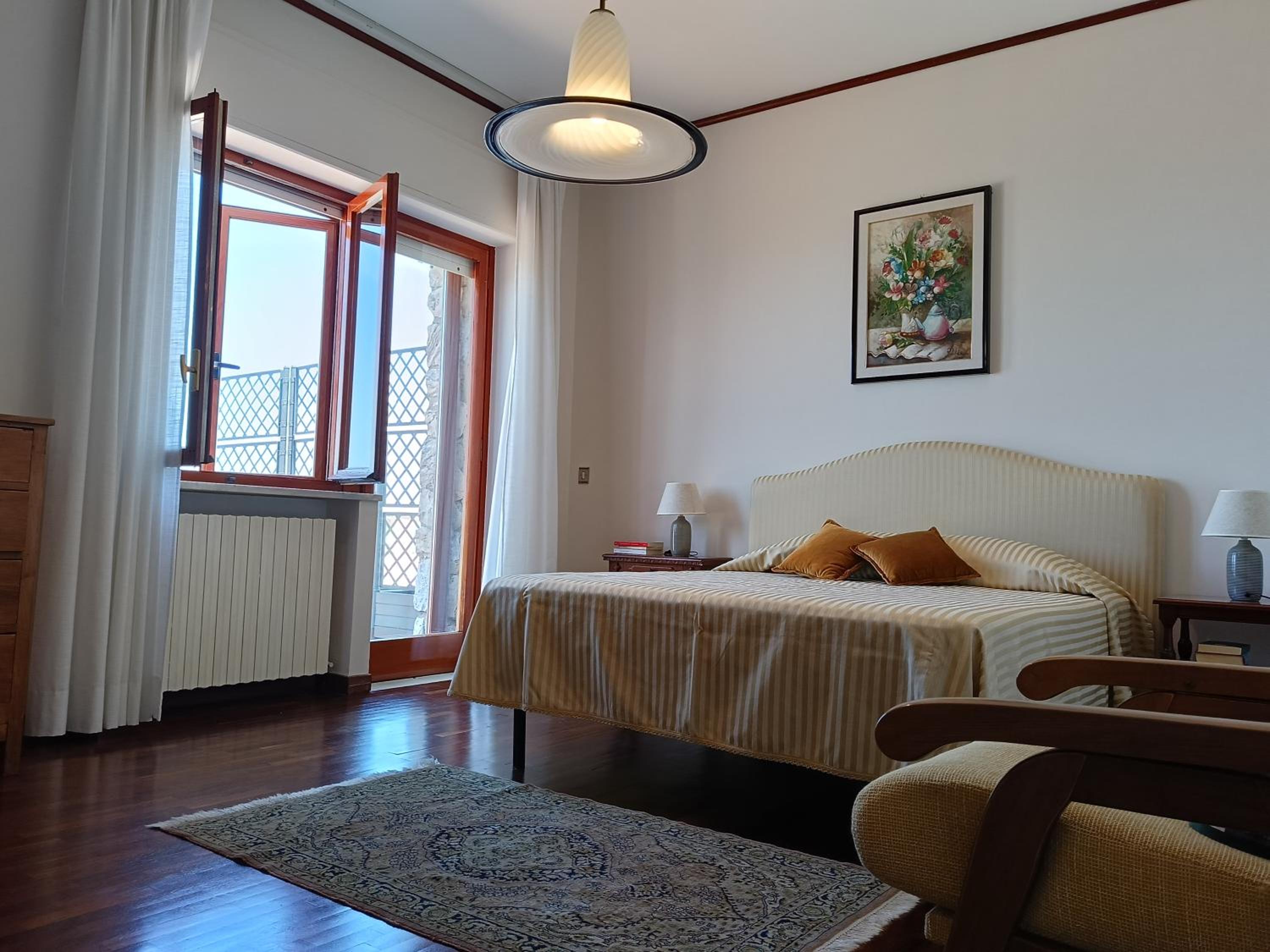 Queen Room with Shared Bathroom