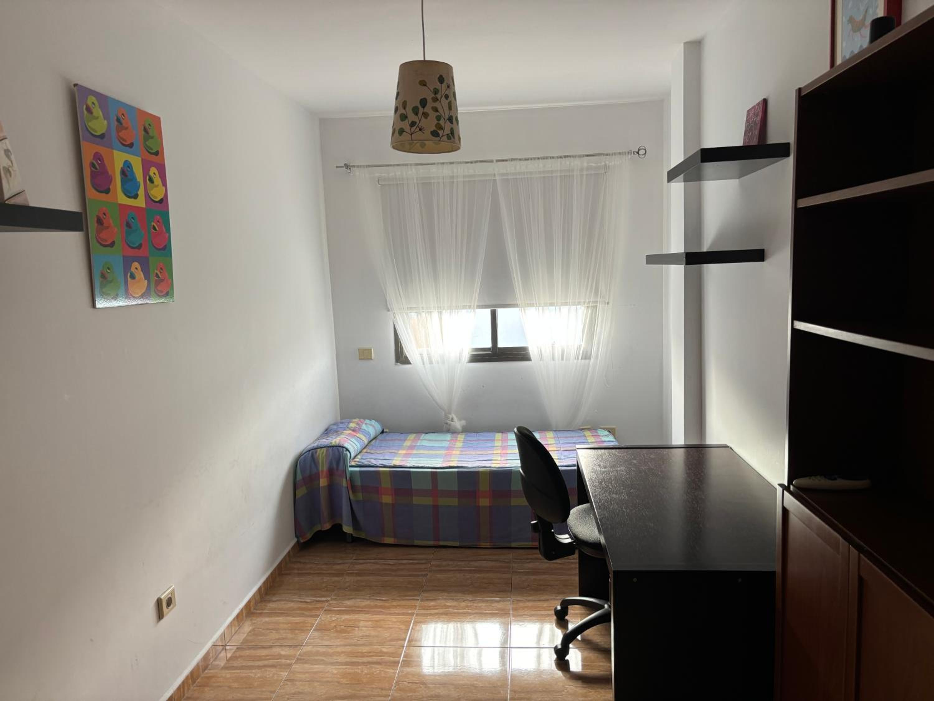 Three-Bedroom Apartment photo 2