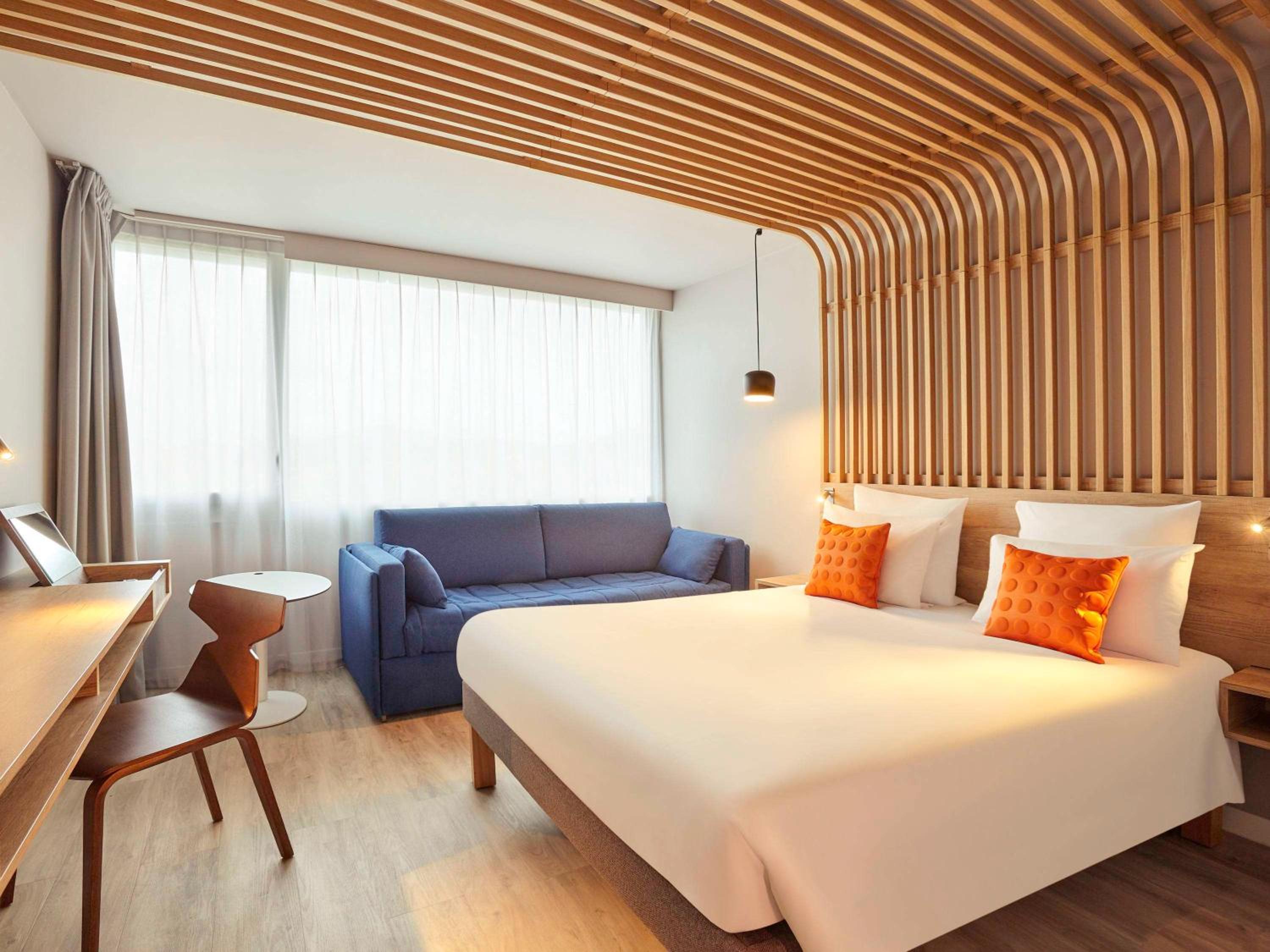 Superior Room with One Double Bed and One Sofa Bed - Dune and Parking Side photo 1