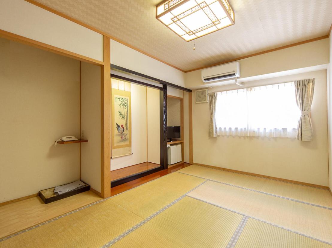 Japanese-Style Quadruple Room - Smoking photo 1