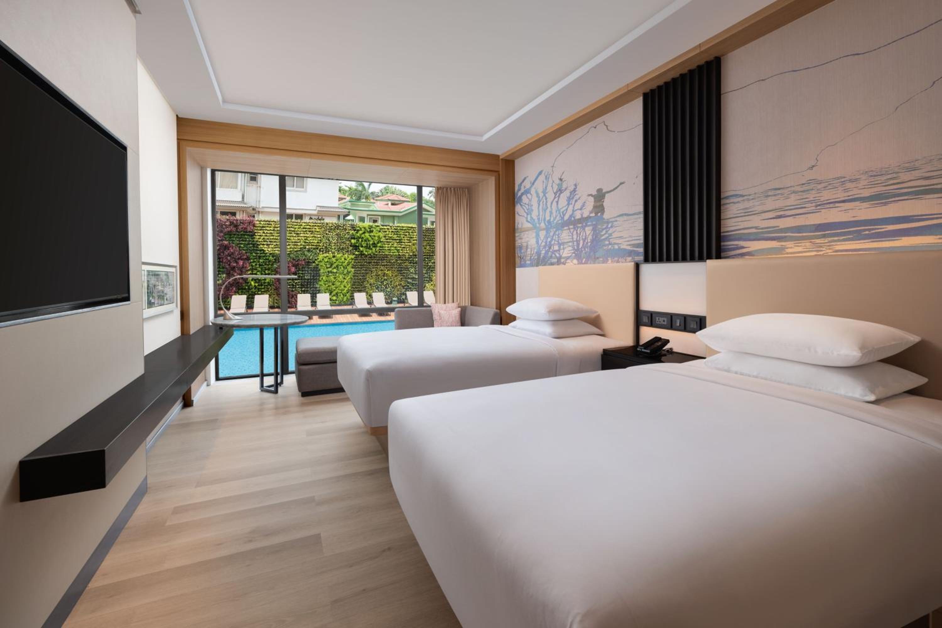 Deluxe Guest room, 2 Queen, Partial pool view with INR 500 Spa credit on min therapy of 60 mins per stay - Photo 5
