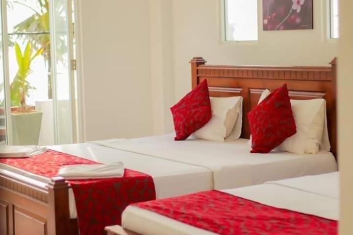 Quarto Triplo Deluxe com Vista para o Mar