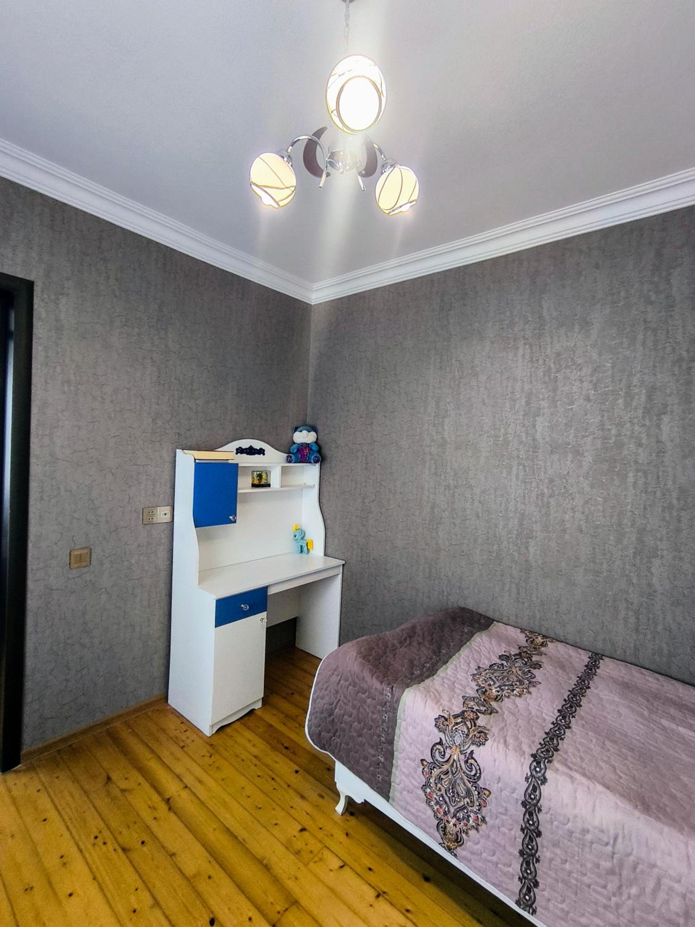 Three-Bedroom House photo 1