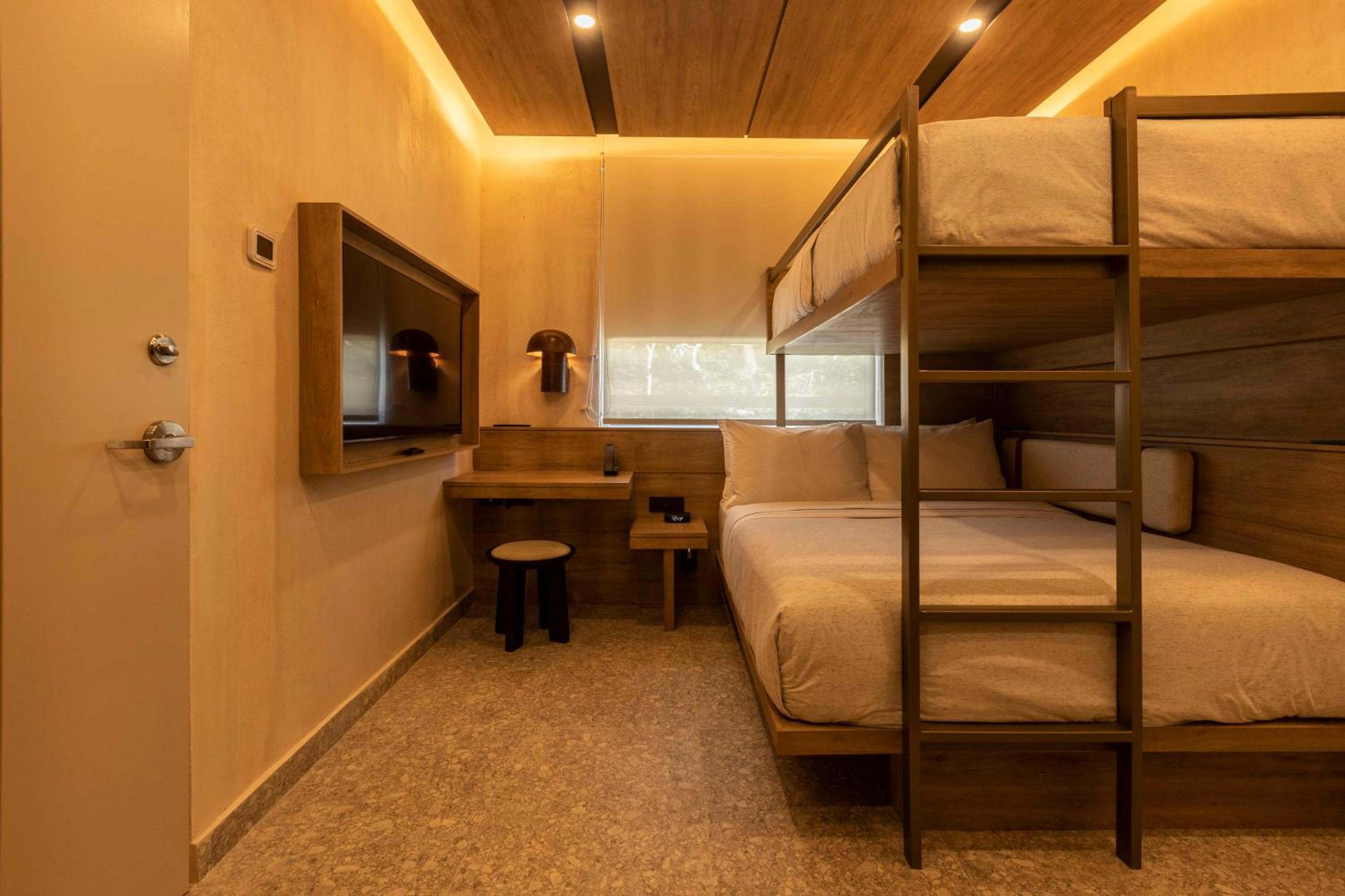 Room with Bunk Beds-One Twin Bed over One Queen Bed and Roof Top Access - Photo 3