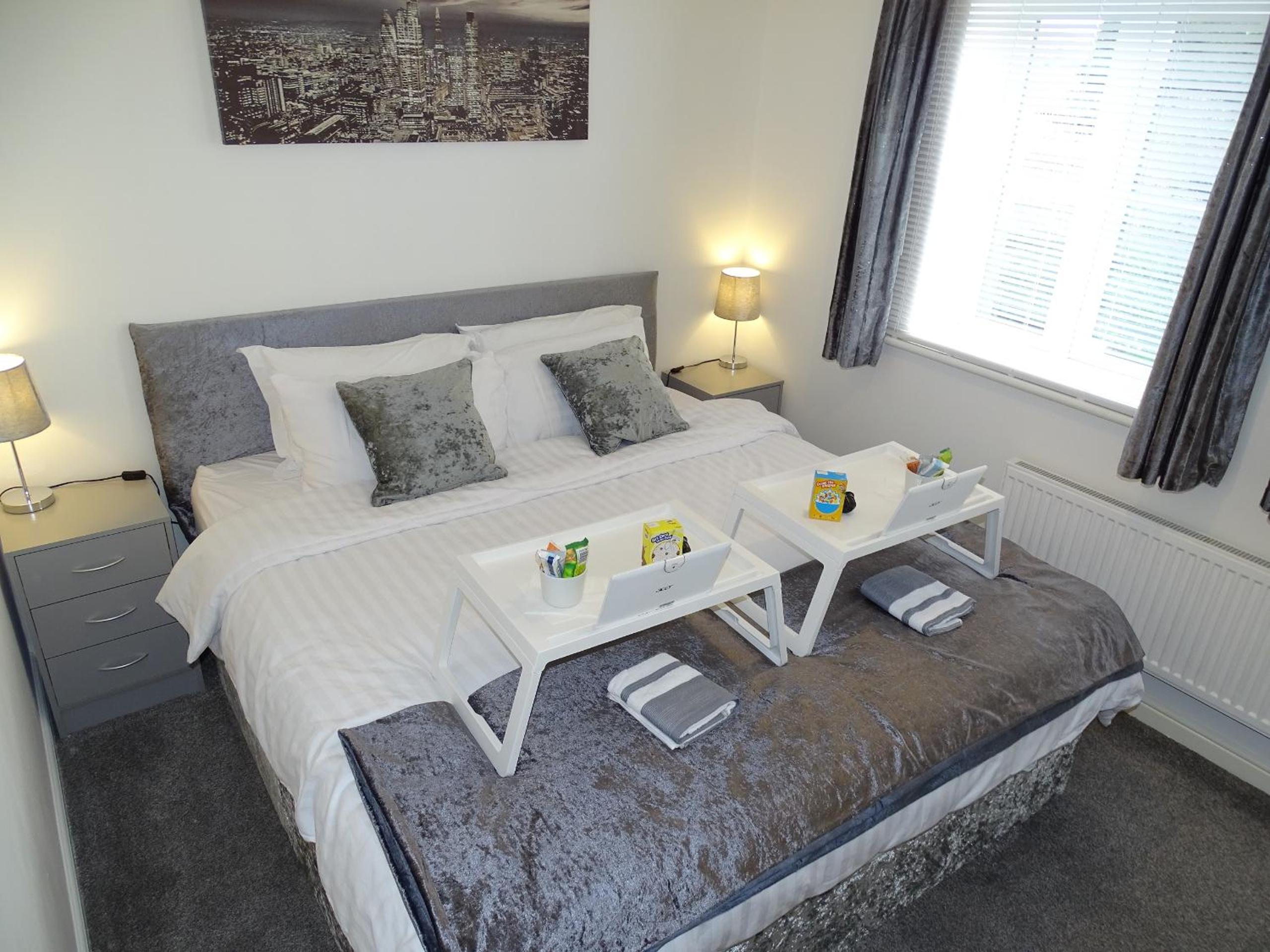Three-Bedroom Apartment - Photo 41